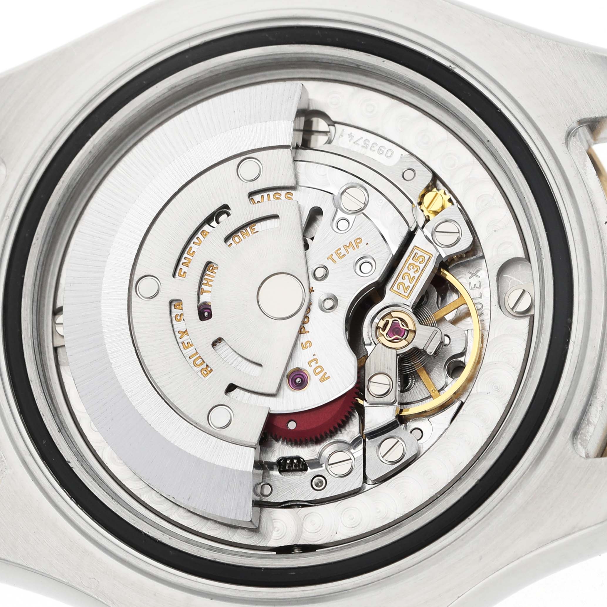 The image shows a close-up of the Rolex Yacht-Master 168623 Men's Steel and Gold (two tone) White Dial's movement, focusing on the intricate mechanical components.