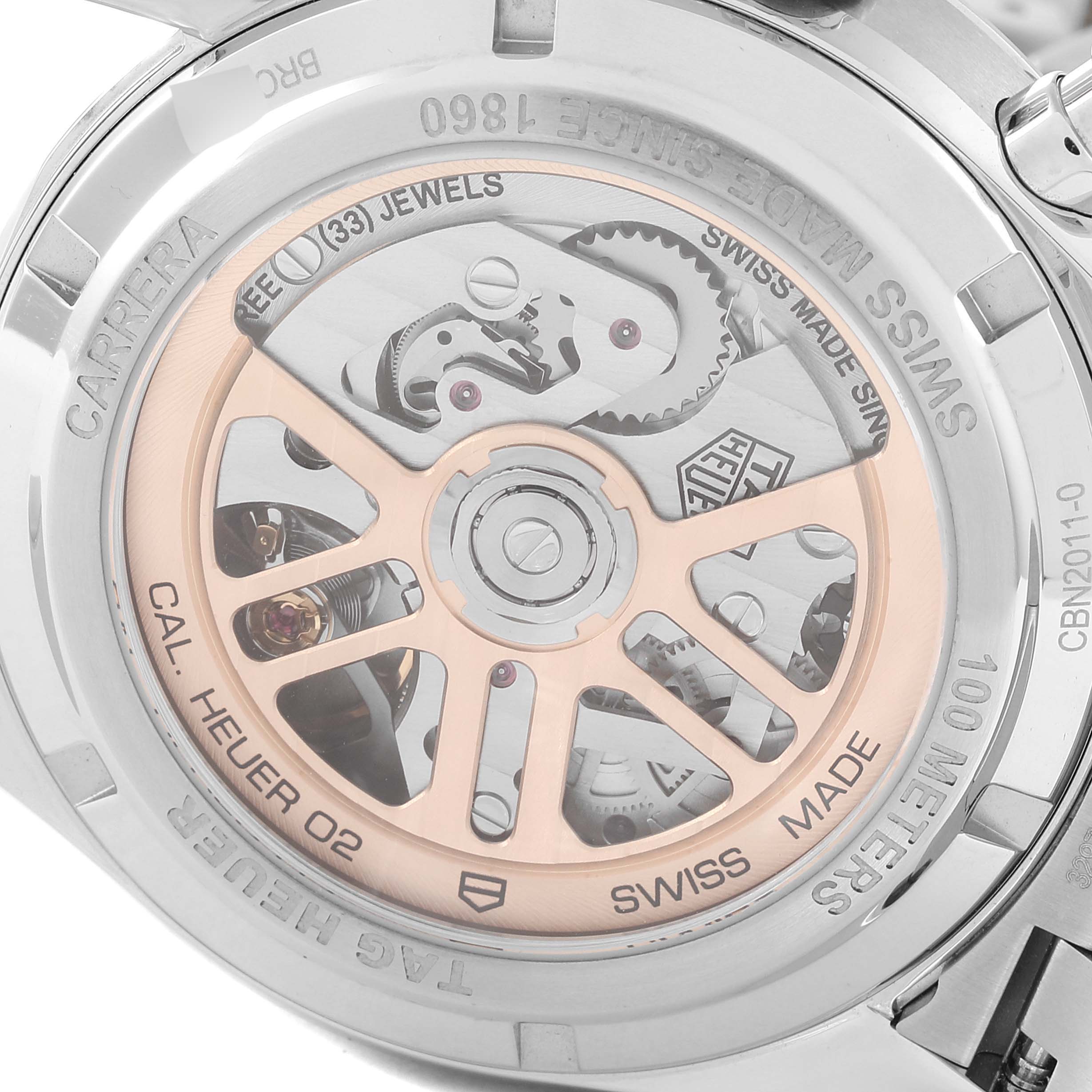 The image shows the back view of the Tag Heuer Carrera CBN2011.BA0642 Men's Stainless Steel Blue Dial CBN2011.BA0642 Men's Stainless Steel Blue Dial watch, highlighting its movement and rotor.