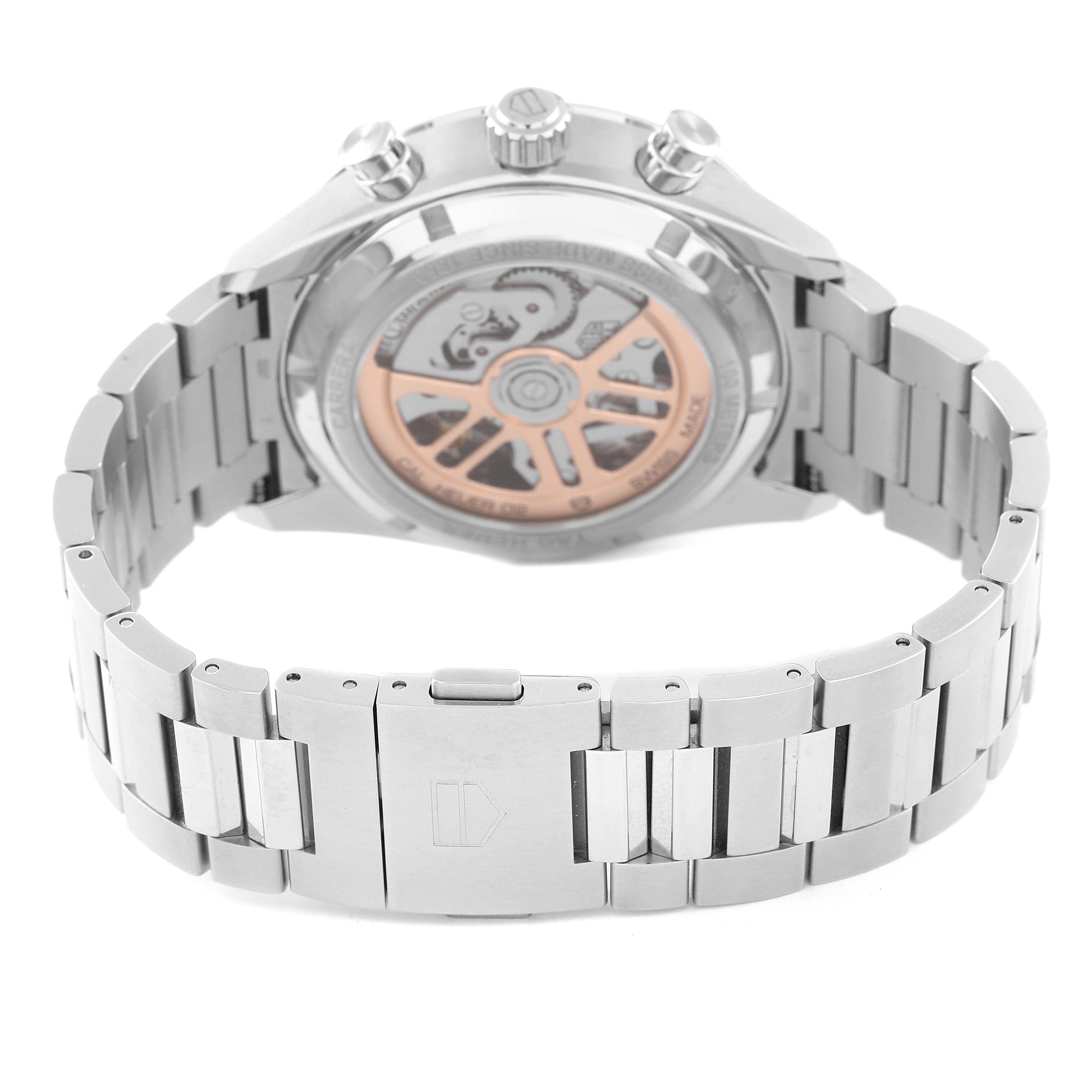 The image shows the back view of a Tag Heuer Carrera CBN2011.BA0642 Men's Stainless Steel Blue Dial CBN2011.BA0642 Men's Stainless Steel Blue Dial watch, highlighting the stainless steel bracelet and the transparent case back displaying the movement.