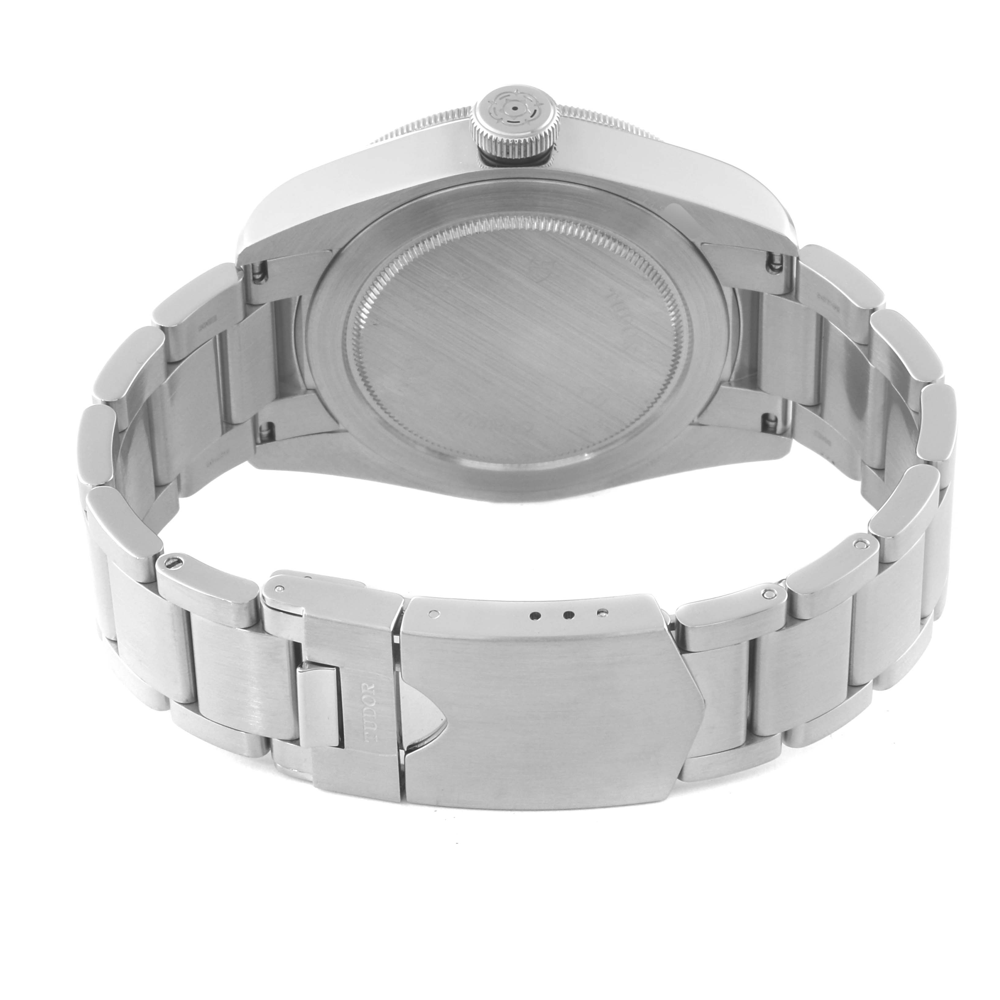 This image shows the back case and bracelet clasp of a Tudor Heritage Black Bay 79220B Men's Stainless Steel Black Dial 79220B Men's Stainless Steel Black Dial watch.