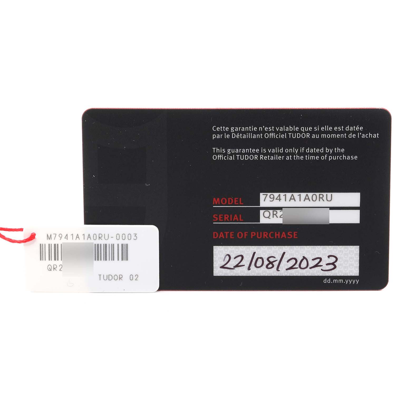 This image shows the warranty card for the Tudor Heritage Black Bay 7941A1A0RU Men
s Stainless Steel Black Dial 7941A1A0RU Men
s Stainless Steel Black Dial model watch, displaying the model number, serial number, and date of purchase.