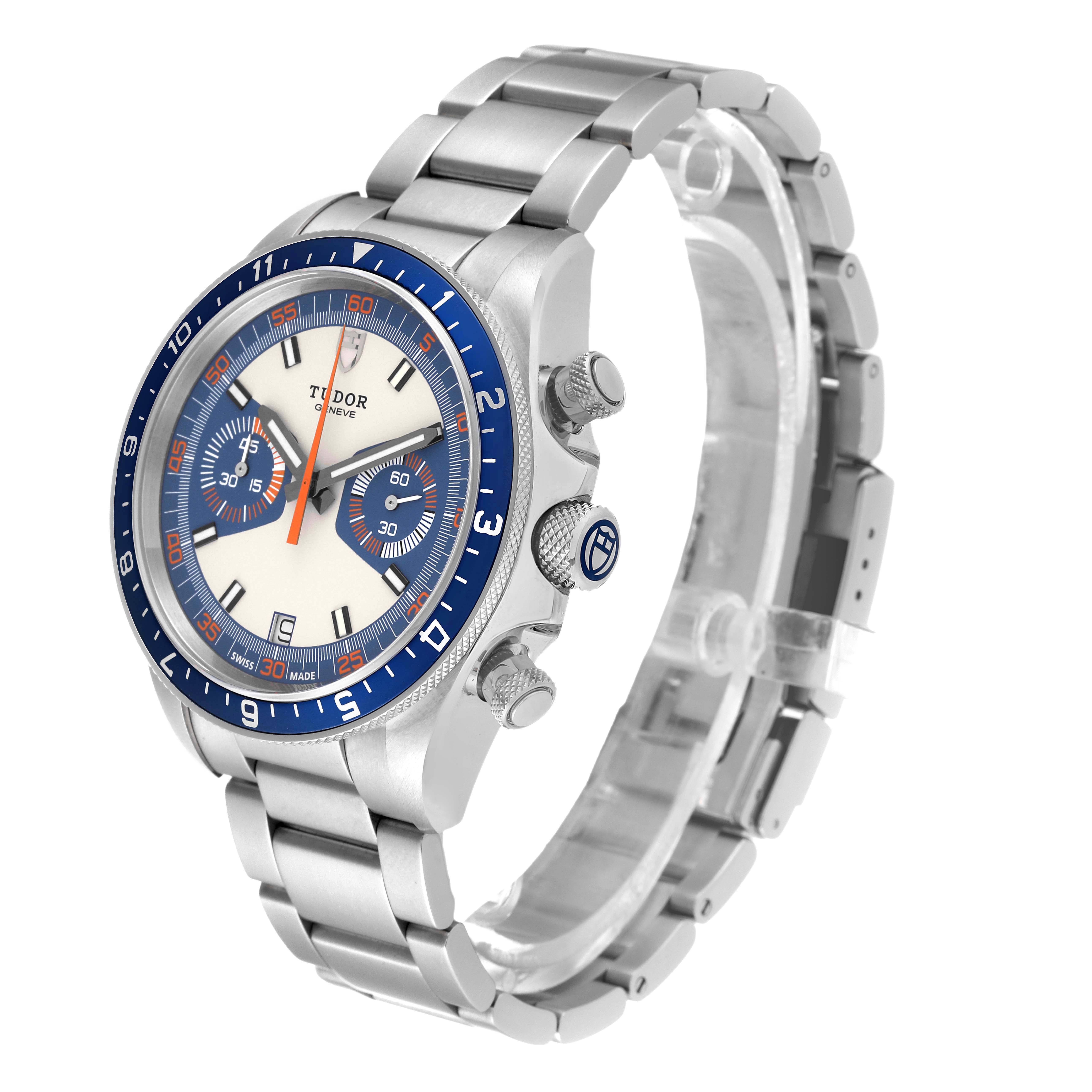 The image shows a Tudor Heritage Chrono 70330B Men's Stainless Steel Blue Dial 70330B Men's Stainless Steel Blue Dial watch, angled to display the face, side buttons, crown, and steel bracelet.