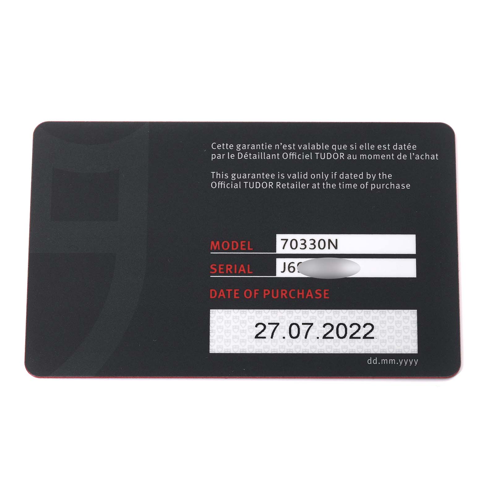 This image shows the warranty card for a Tudor Heritage Chrono 70330N Men
s Stainless Steel Grey Dial 70330N Men
s Stainless Steel Grey Dial model, including model number, serial number, and purchase date.