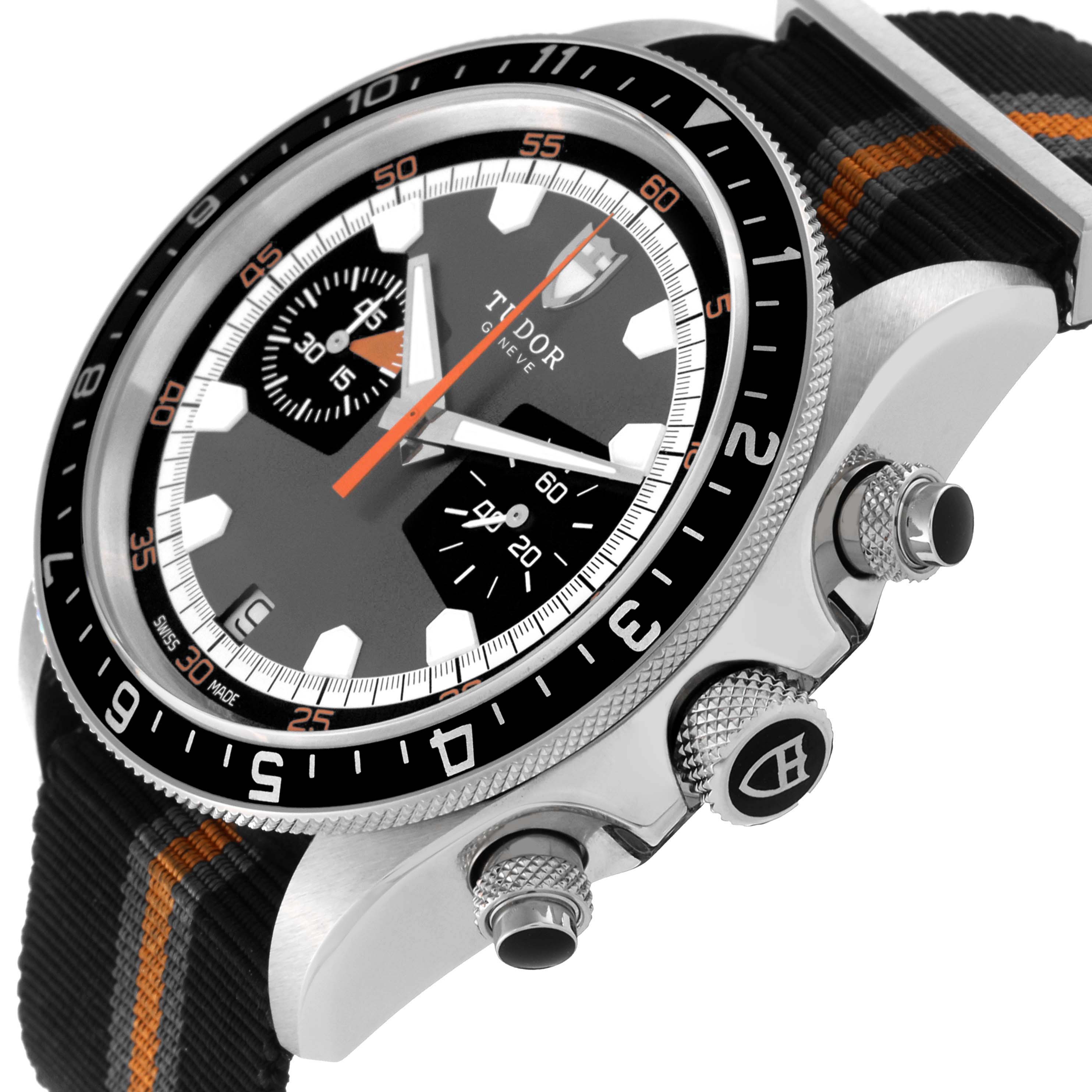 This image shows a Heritage Chrono model by Tudor at an angle highlighting the dial, pushers, bezel, and strap.