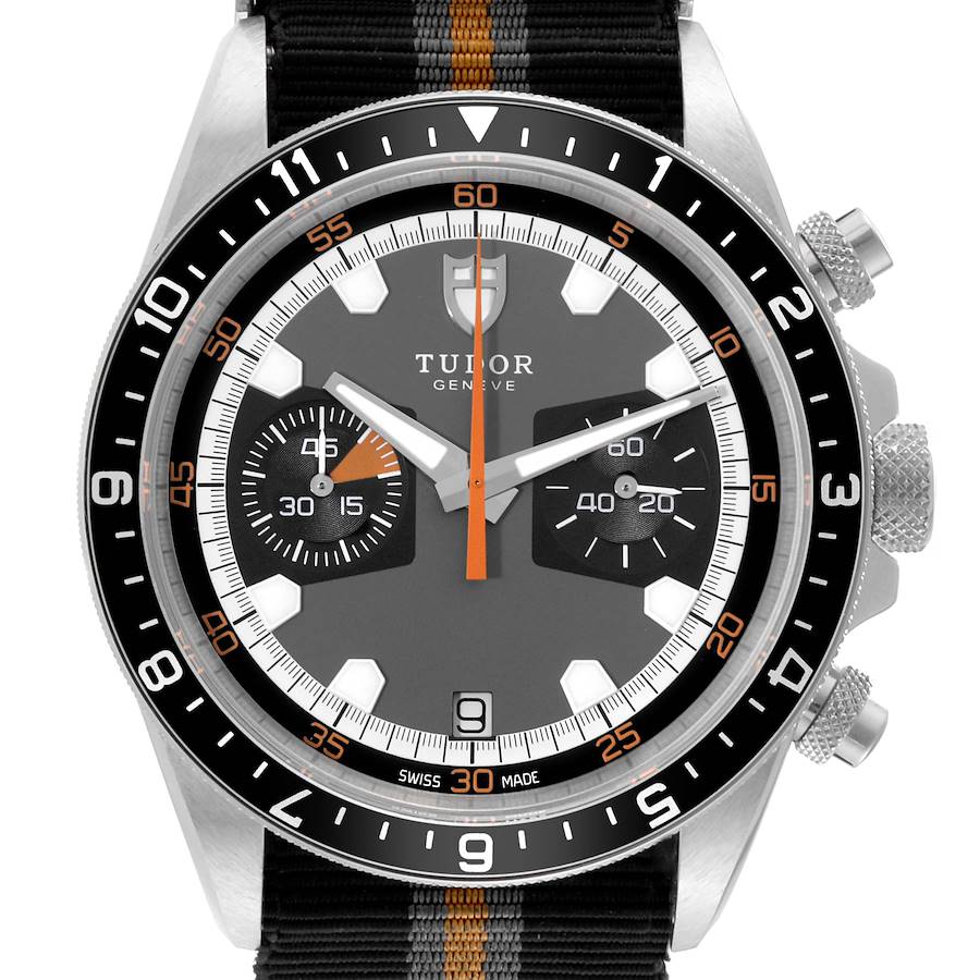 The image shows a front angle view of a Tudor Heritage Chrono watch face and its buttons on the side.