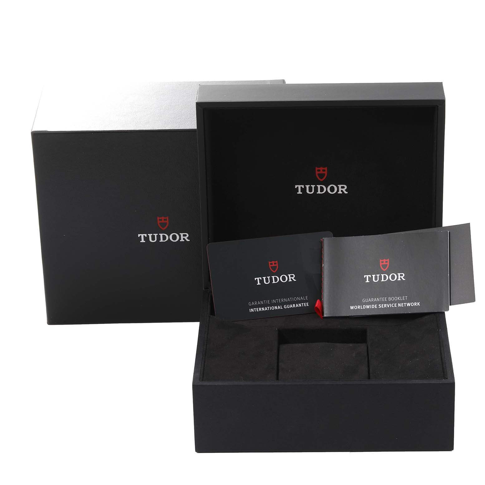 The image shows the box, guarantee booklet, and international guarantee card for the Tudor Heritage Chrono 70330N Men
s Stainless Steel Grey Dial 70330N Men
s Stainless Steel Grey Dial watch, all at a straightforward angle.