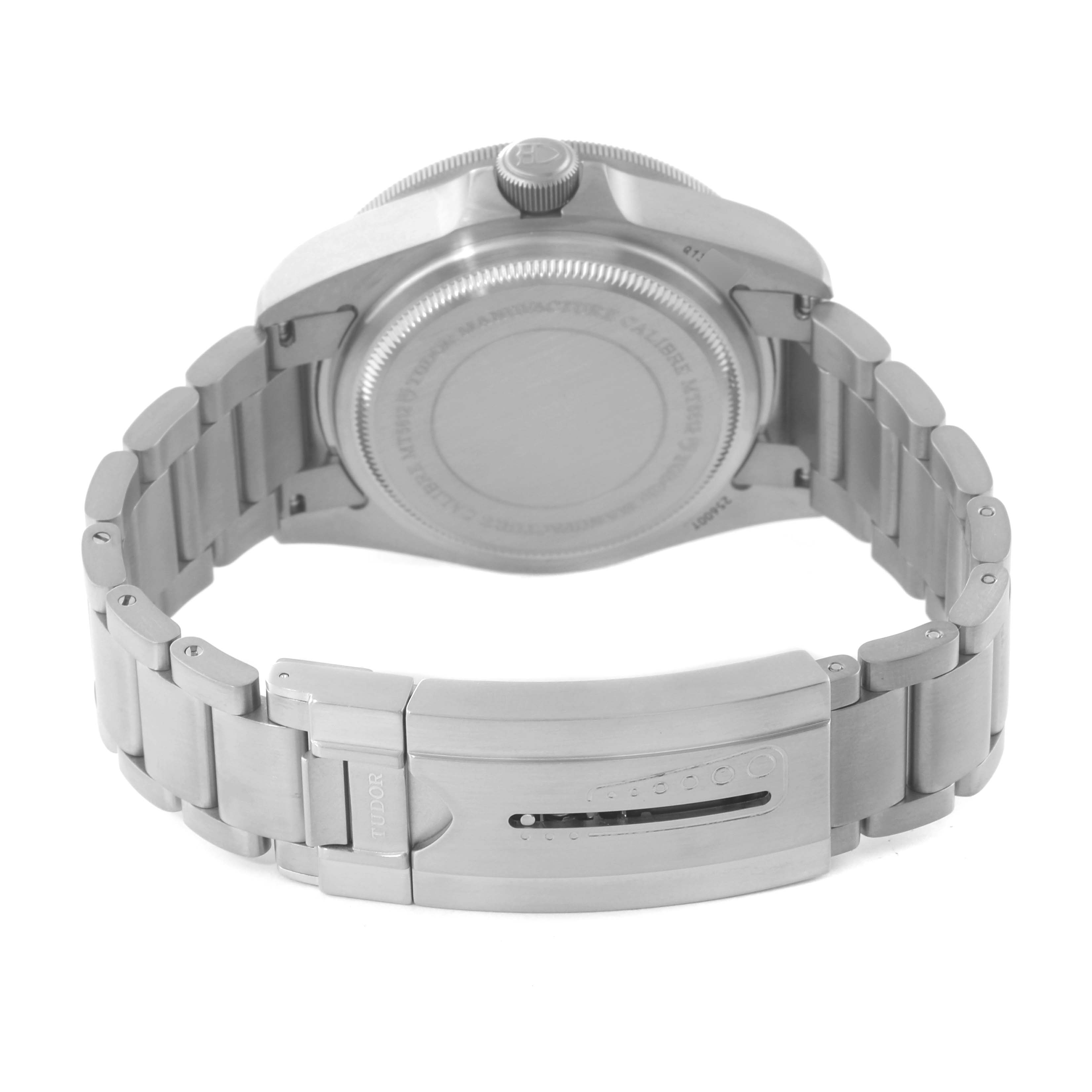 This image shows the backside and metal bracelet of a Tudor Pelagos 25600TN Men
s Titanium Black Dial 25600TN Men
s Titanium Black Dial watch, featuring its clasp and case back.