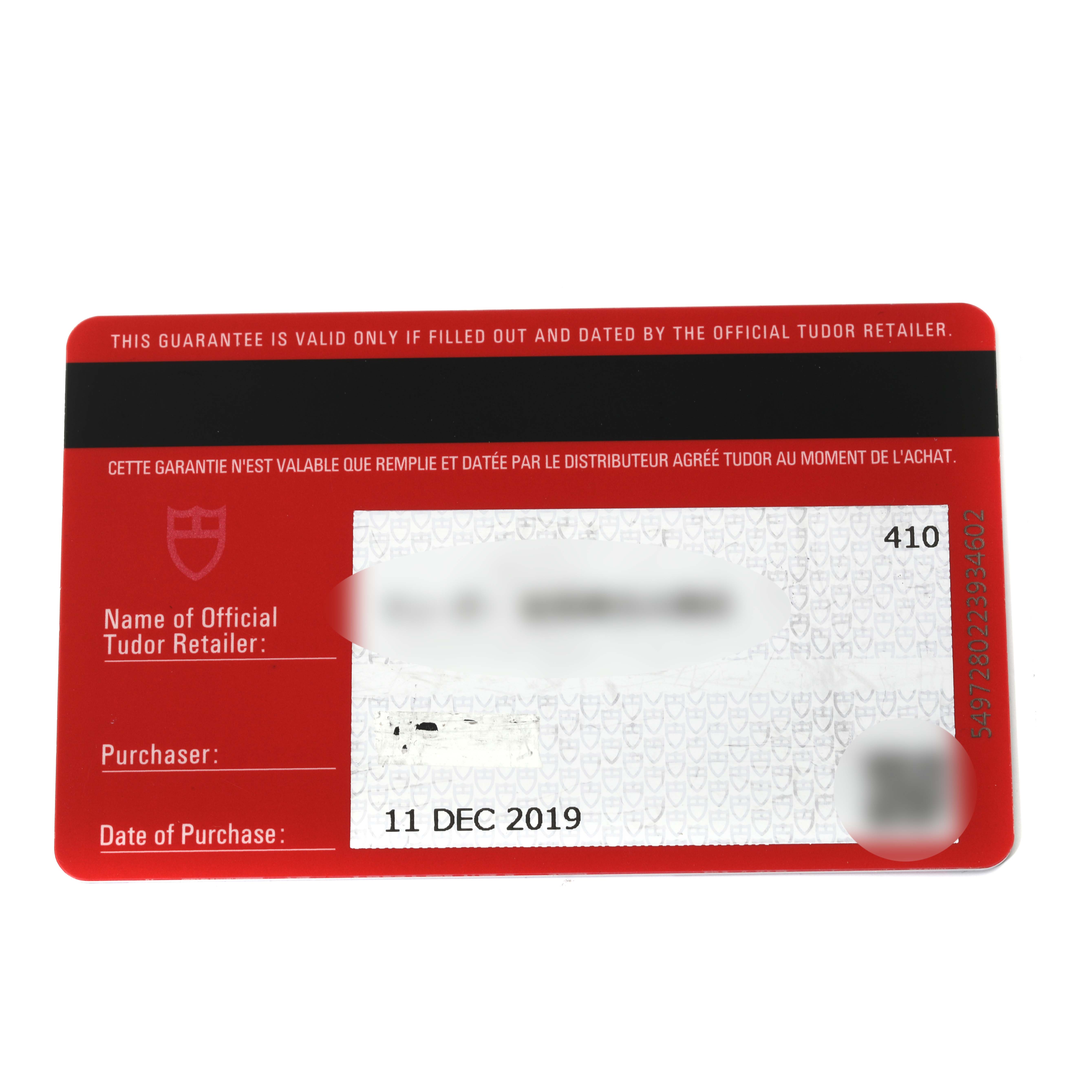 This image shows a warranty card for a Tudor Pelagos 25600TN Men
s Titanium Black Dial 25600TN Men
s Titanium Black Dial model watch, with purchase and retailer details.