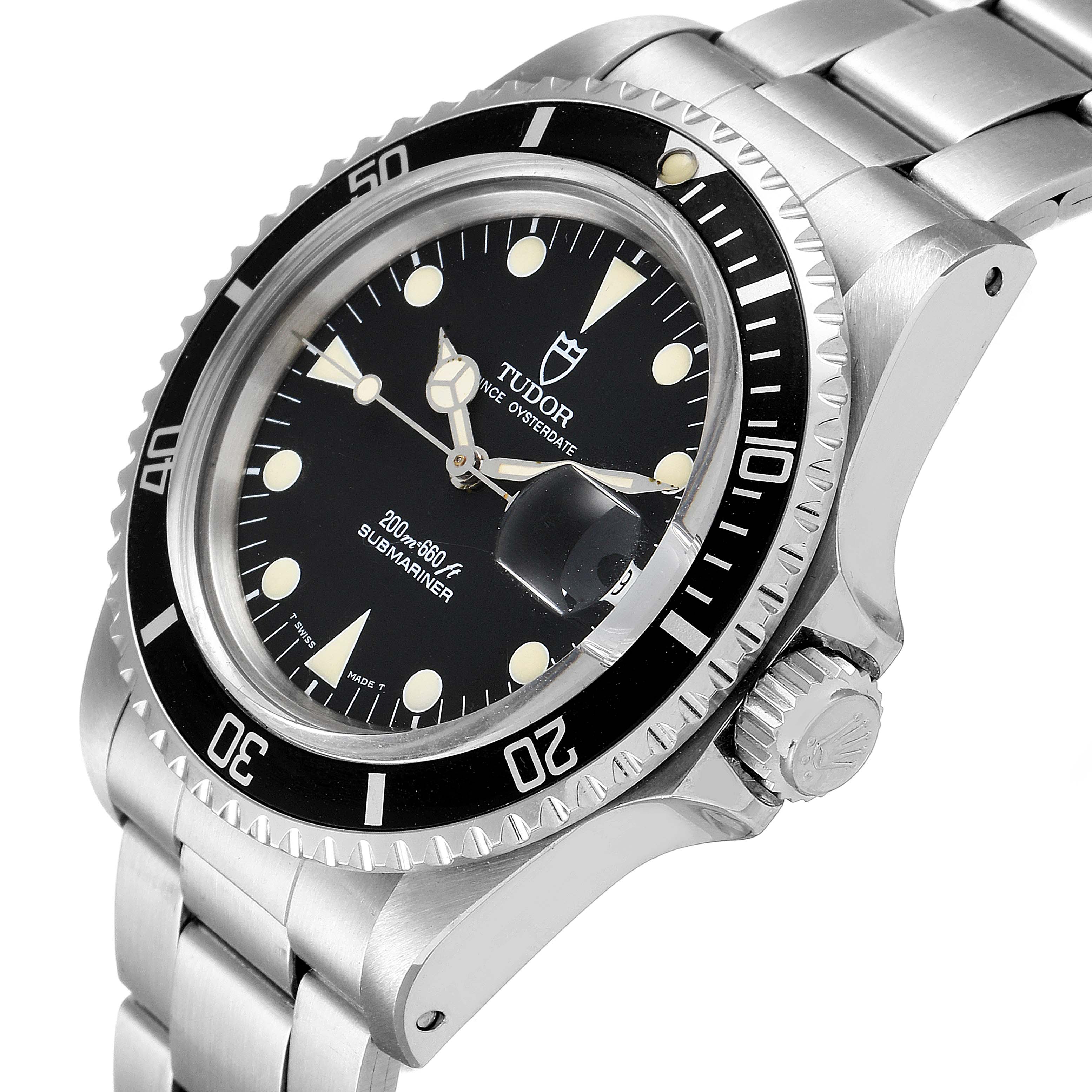 The Tudor Submariner 79090 Men's Stainless Steel Black Dial 79090 Men's Stainless Steel Black Dial watch is shown at an angle displaying its dial, bezel, crown, and stainless steel bracelet.