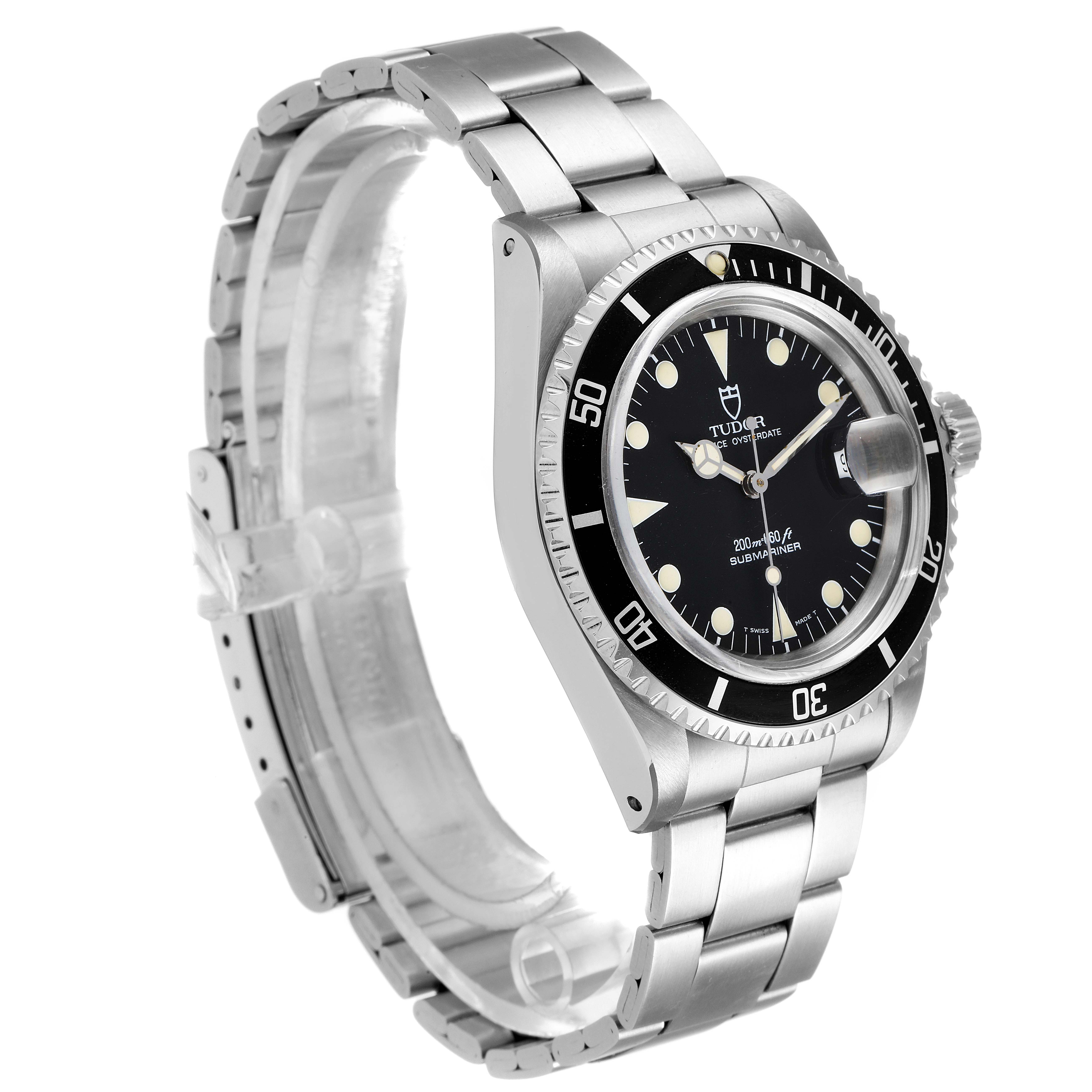 The image shows a side angle view of a Tudor Submariner 79090 Men's Stainless Steel Black Dial 79090 Men's Stainless Steel Black Dial watch, highlighting its dial, bezel, crown, and stainless steel bracelet.