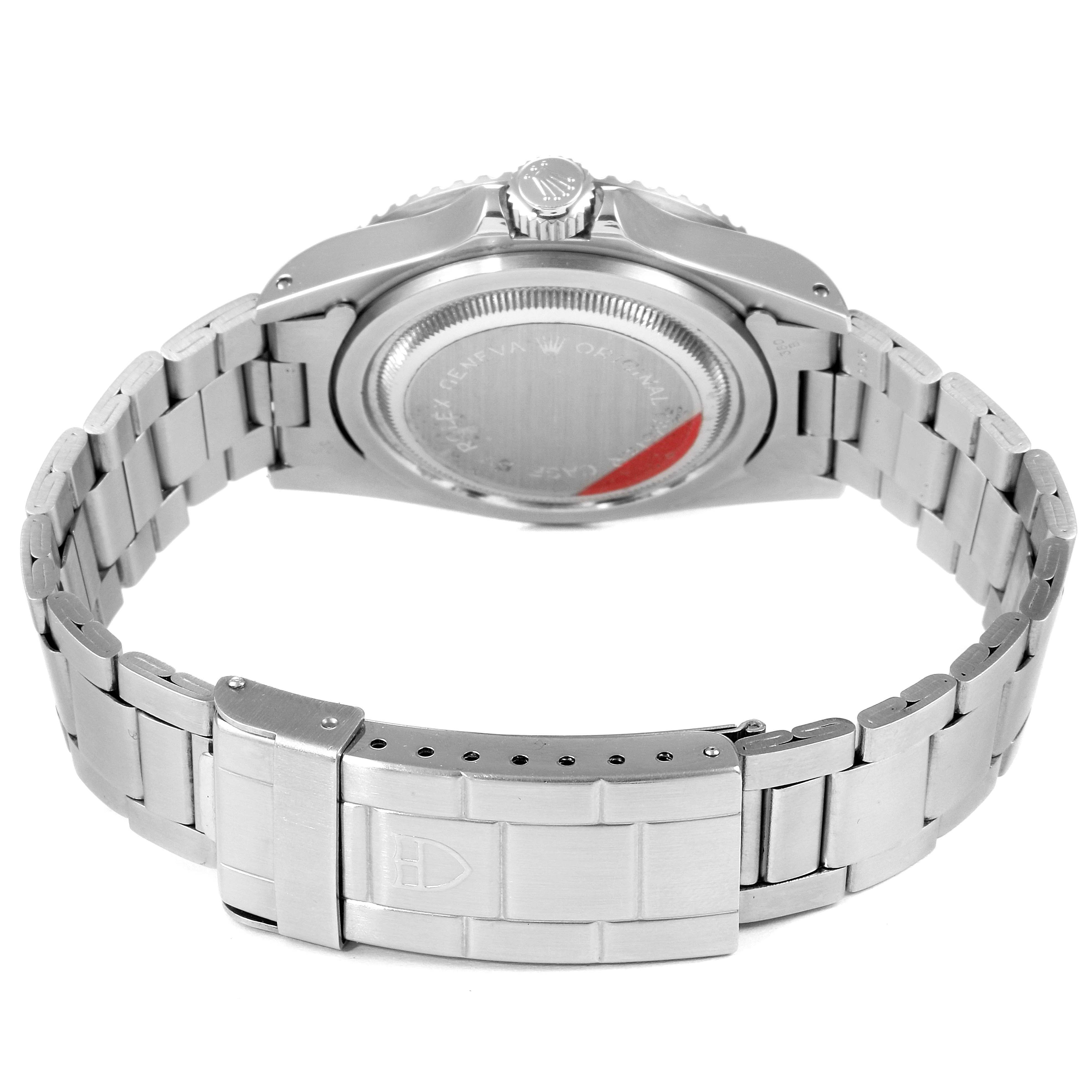 The image shows the back view of a Tudor Submariner 79090 Men's Stainless Steel Black Dial 79090 Men's Stainless Steel Black Dial watch, focusing on its case back, bracelet, and clasp.