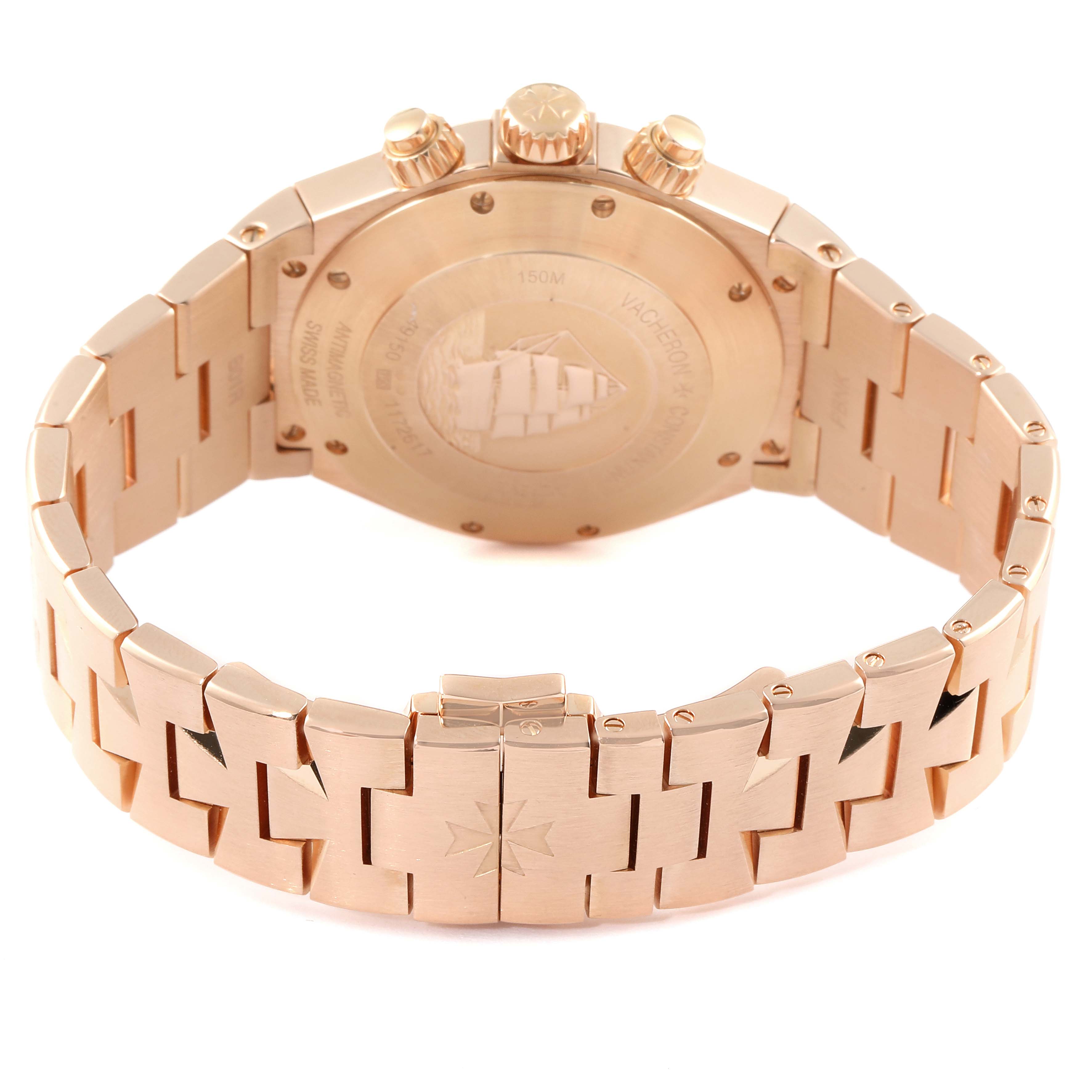 The image shows the gold case back and bracelet of a Vacheron Constantin Overseas 49150/B01R-9454 Men's Rose Gold Silver Dial 49150/B01R-9454 Men's Rose Gold Silver Dial model watch from the rear angle.