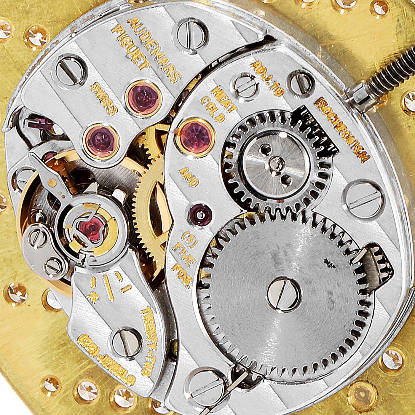 This image shows a close-up view of the movement and inner mechanisms of a vintage Audemars Piguet watch.
