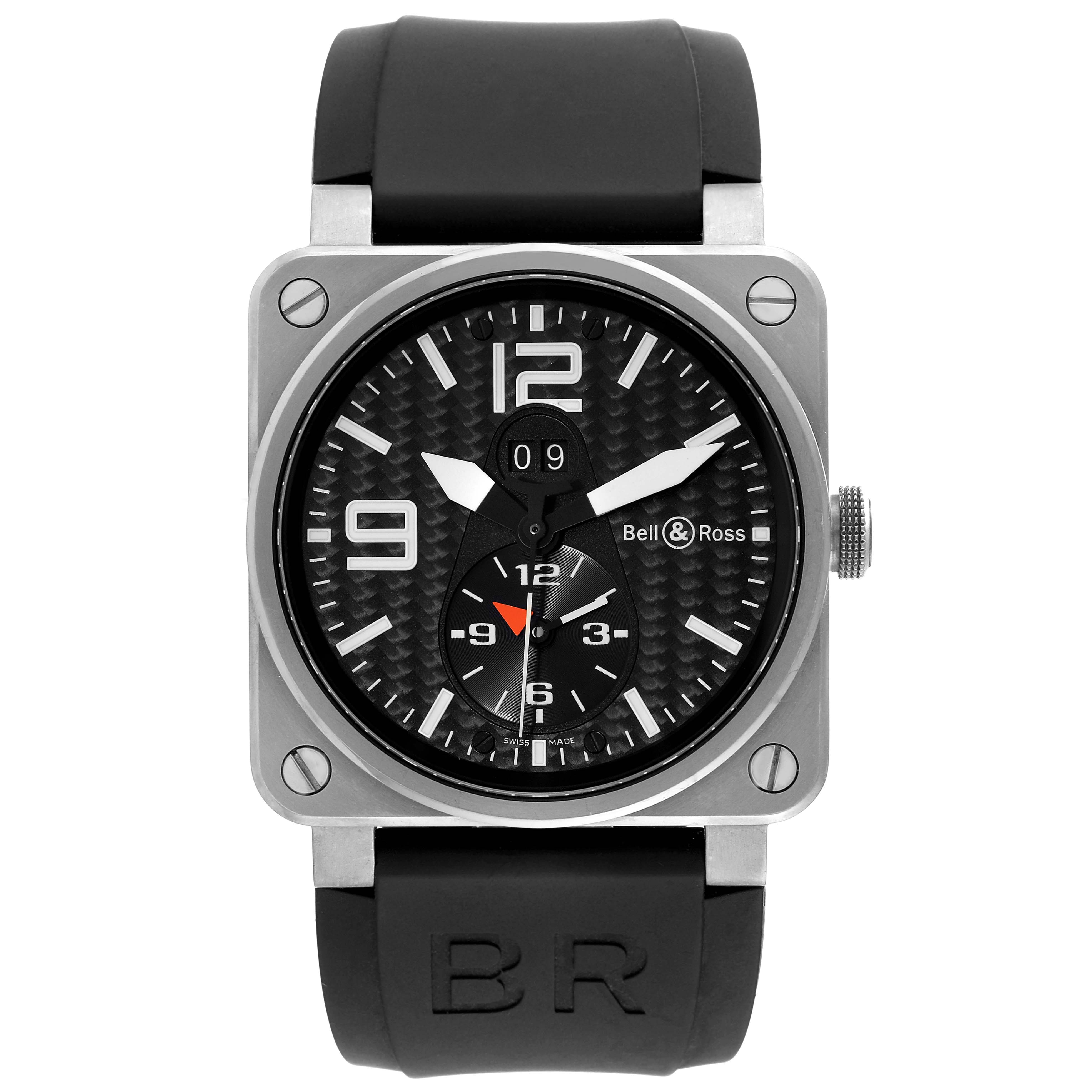 The image shows a front view of the Bell & Ross Aeronavale watch, featuring a black dial, numerals, and a black strap with 'BR' engraved.