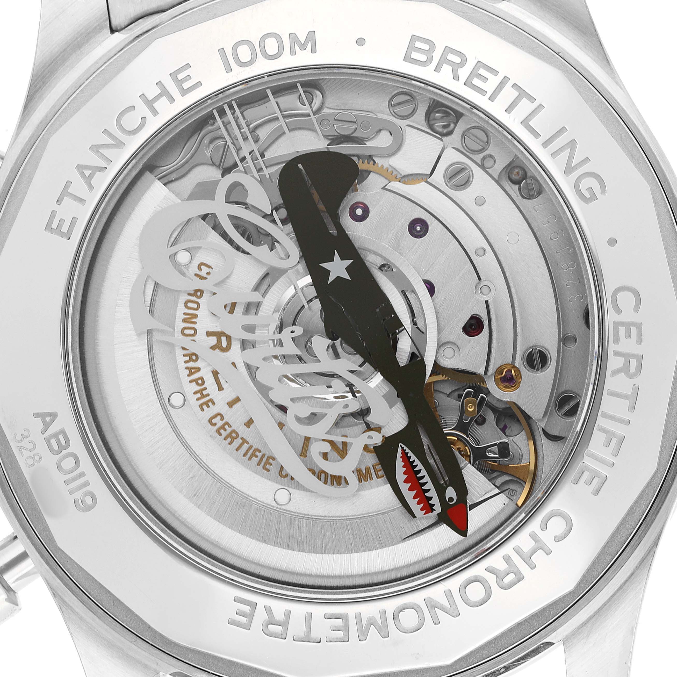 The image shows the case back of a Breitling Aviator AB01192A1L1A1 Men's Stainless Steel Green Dial watch, highlighting its movement and engraved details.