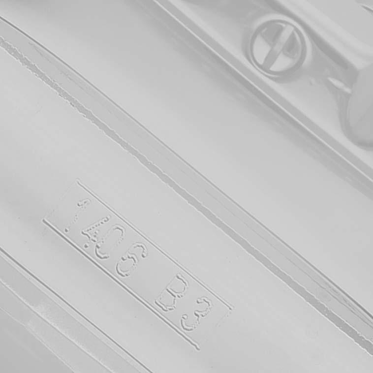 The image shows a close-up view of a numbered engraving on a Bentley model by Breitling.