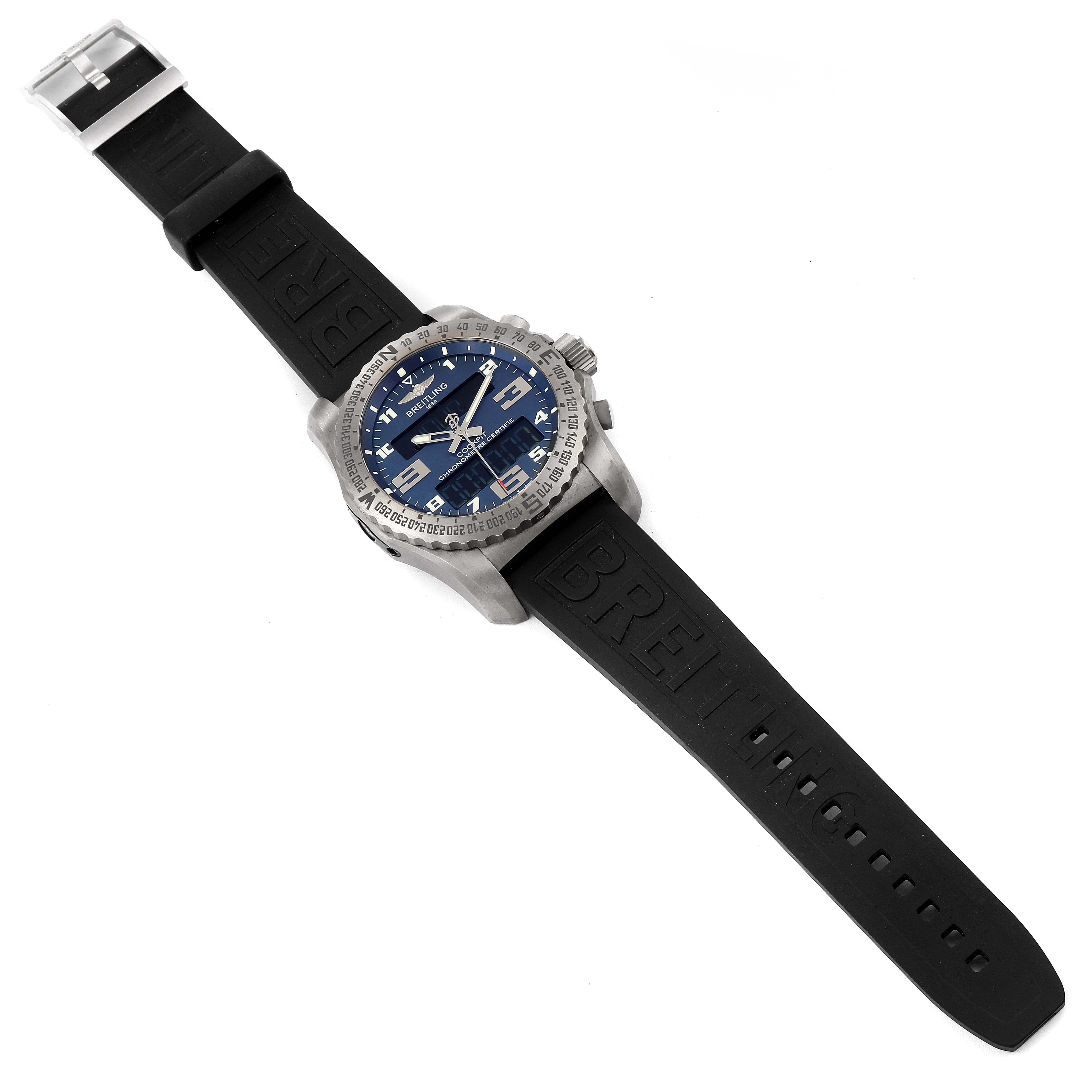 The image shows a top view of the Breitling Professional Series EB5010 Men's Titanium Blue Dial EB5010 Men's Titanium Blue Dial watch displaying its face, bezel, and black rubber strap.