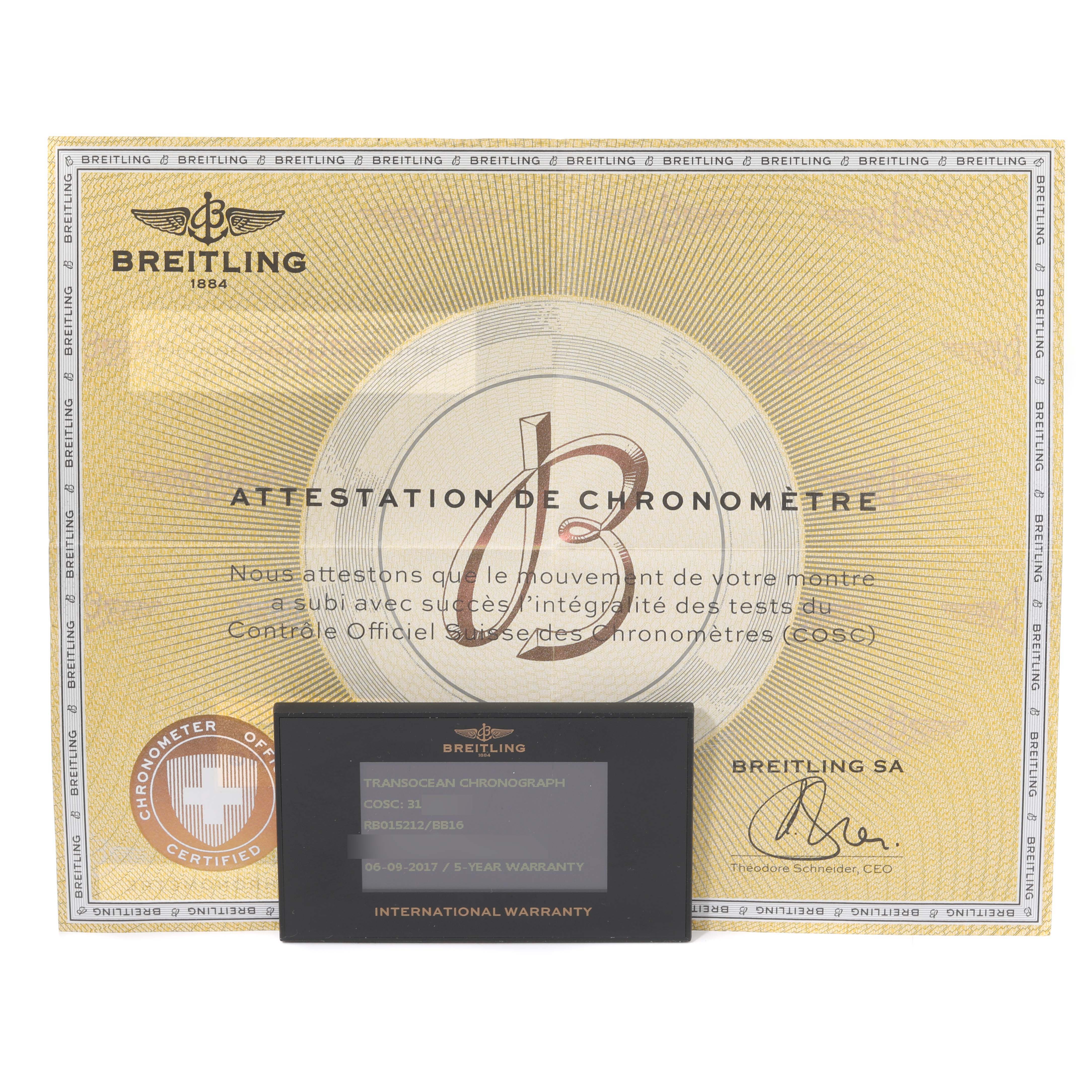 The image shows the certificate and warranty card for the Breitling Transocean RB0152 Men
s Rose Gold Black Dial RB0152 Men
s Rose Gold Black Dial model.