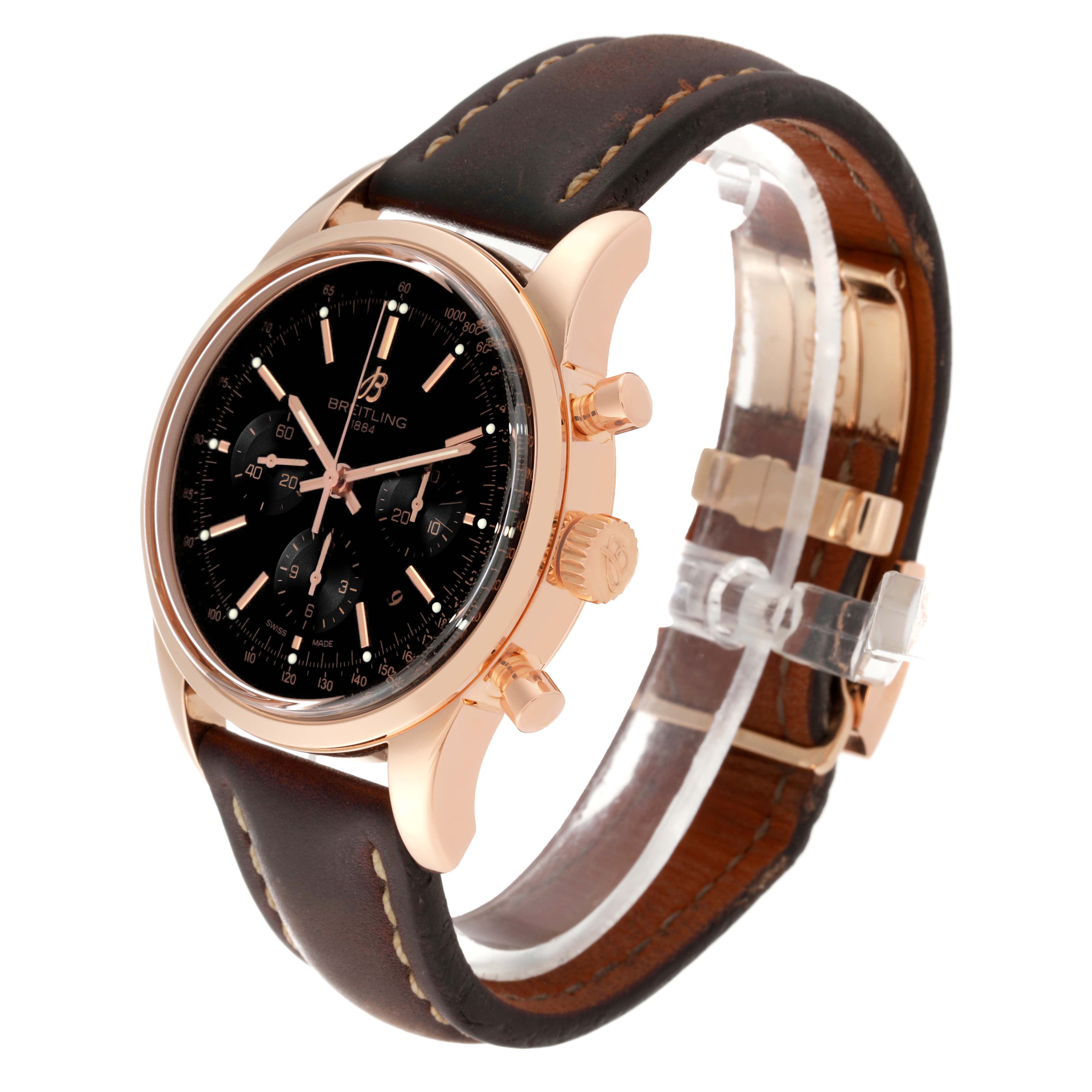 The Breitling Transocean RB0152 Men
s Rose Gold Black Dial RB0152 Men
s Rose Gold Black Dial watch is shown at a three-quarter angle, highlighting the dial, case, crown, pushers, and leather strap.