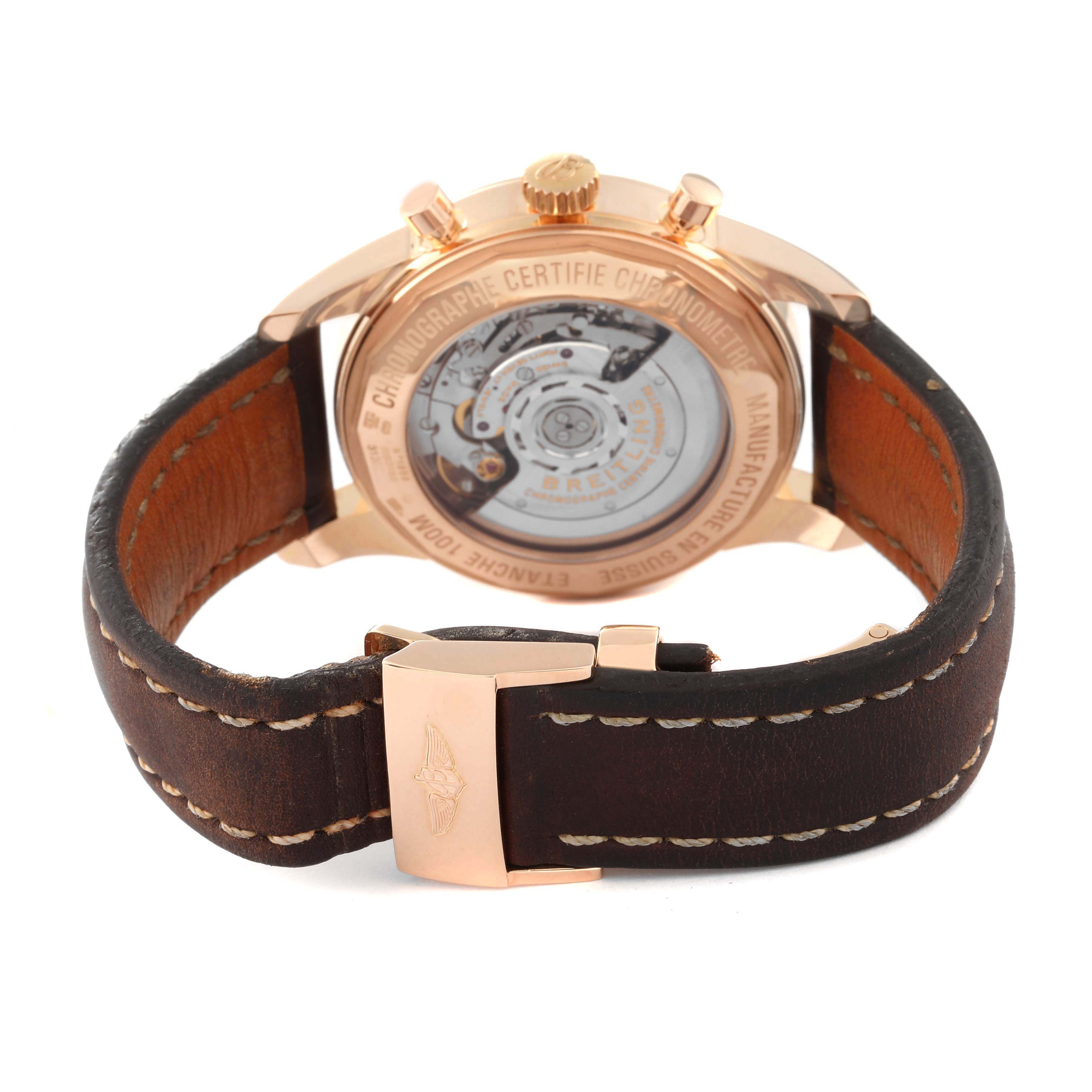 This image shows the back case of the Breitling Transocean RB0152 Men
s Rose Gold Black Dial RB0152 Men
s Rose Gold Black Dial watch at an oblique angle, highlighting its movement and leather strap.