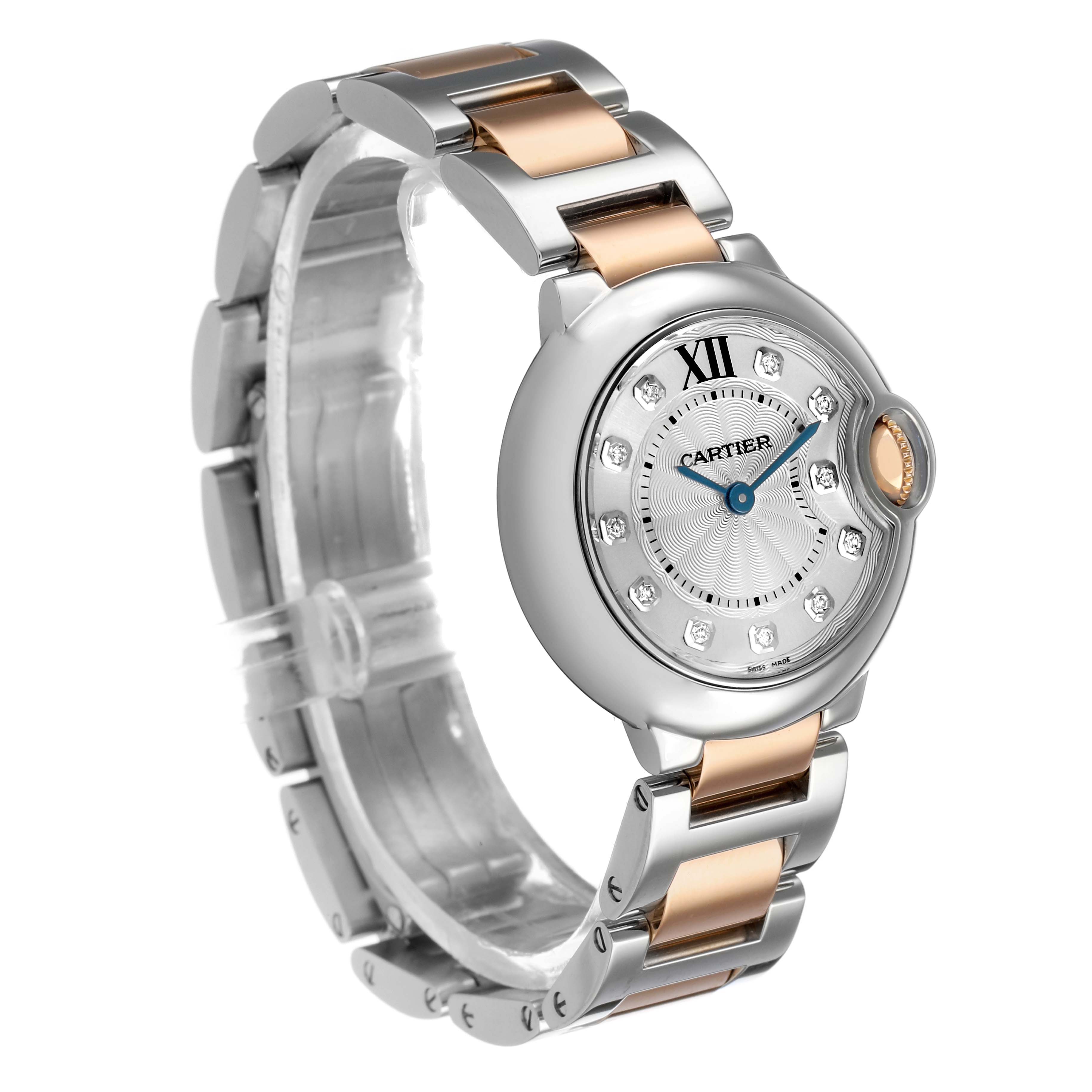 The Cartier Ballon Bleu WE902030 Women's Steel and Gold (two tone) Silver Dial watch is shown at an angle displaying the face, bezel, and two-tone bracelet.