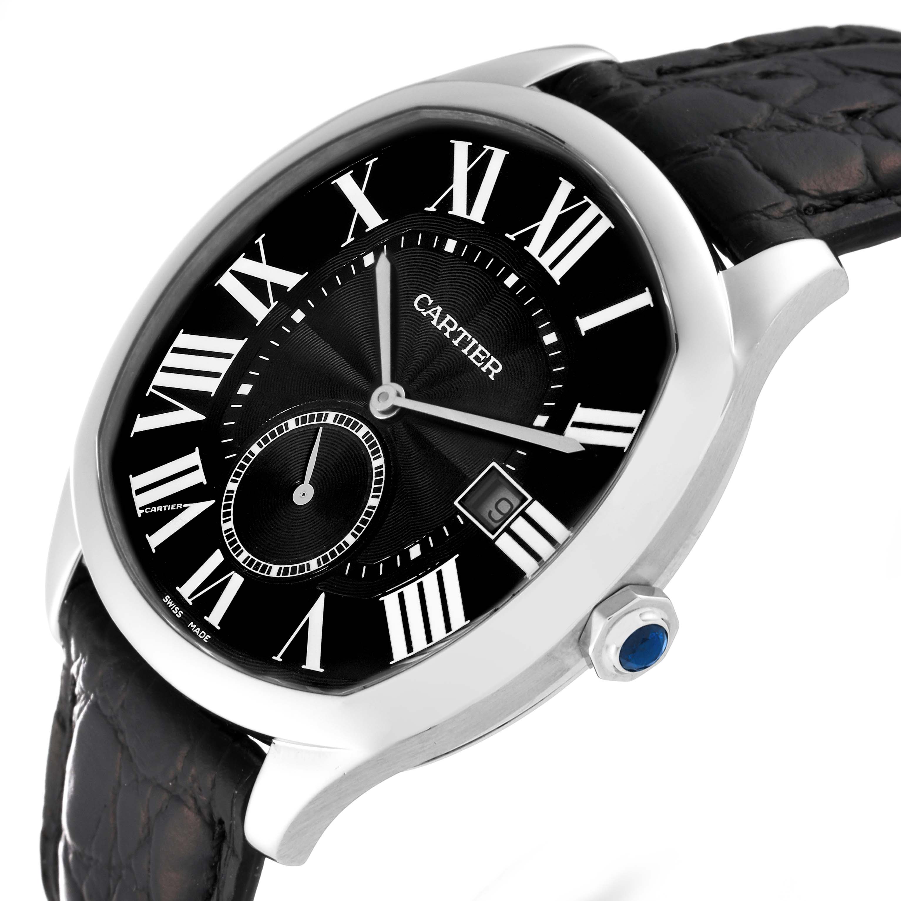 The Drive de Cartier watch is shown at an angle highlighting the black dial, Roman numerals, sub-dial, and date window.