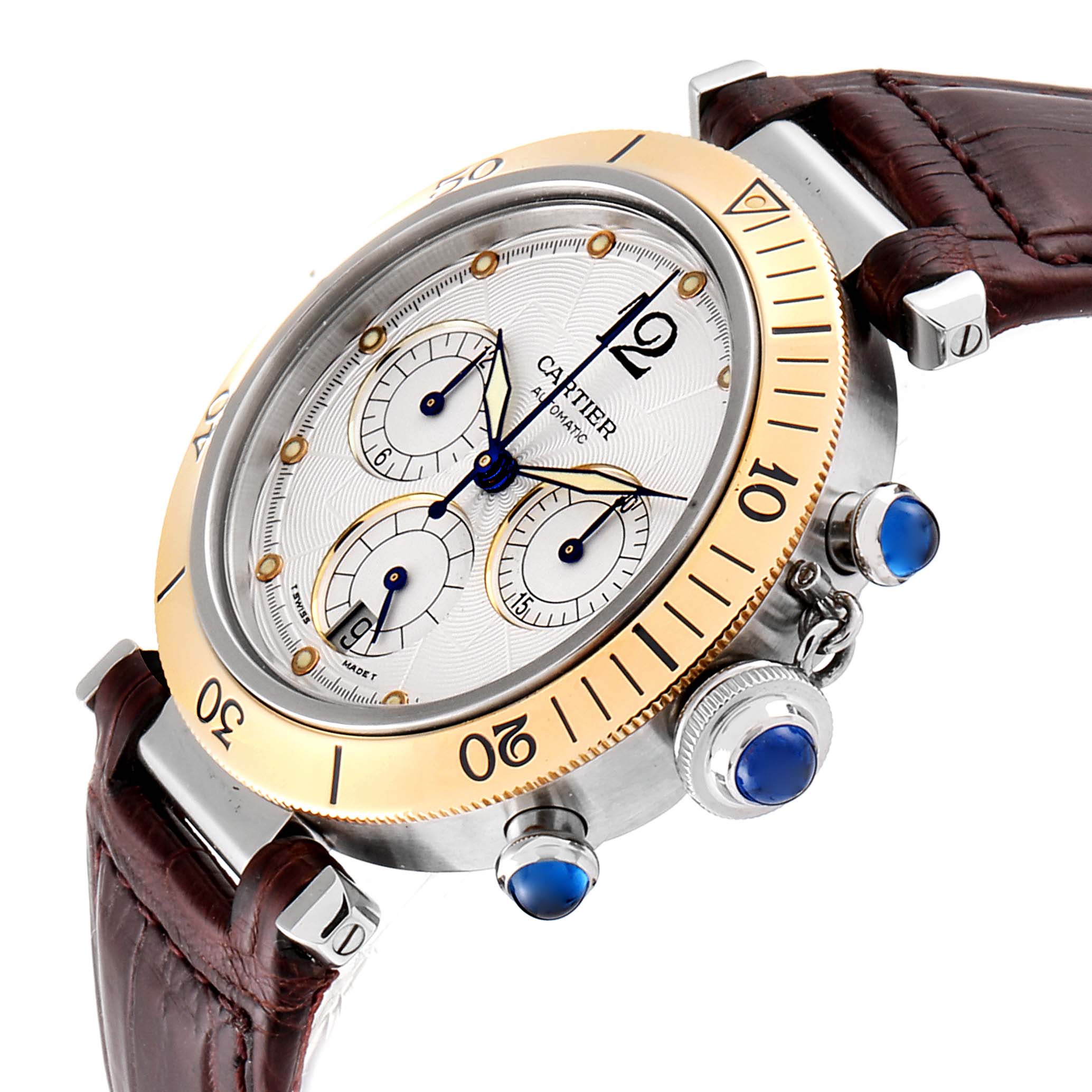 The image shows a Cartier Pasha W3014051 Men's Steel and Gold (two tone) Silver Dial W3014051 Men's Steel and Gold (two tone) Silver Dial watch at an angle highlighting its bezel, dial, subdials, crown, and leather strap.