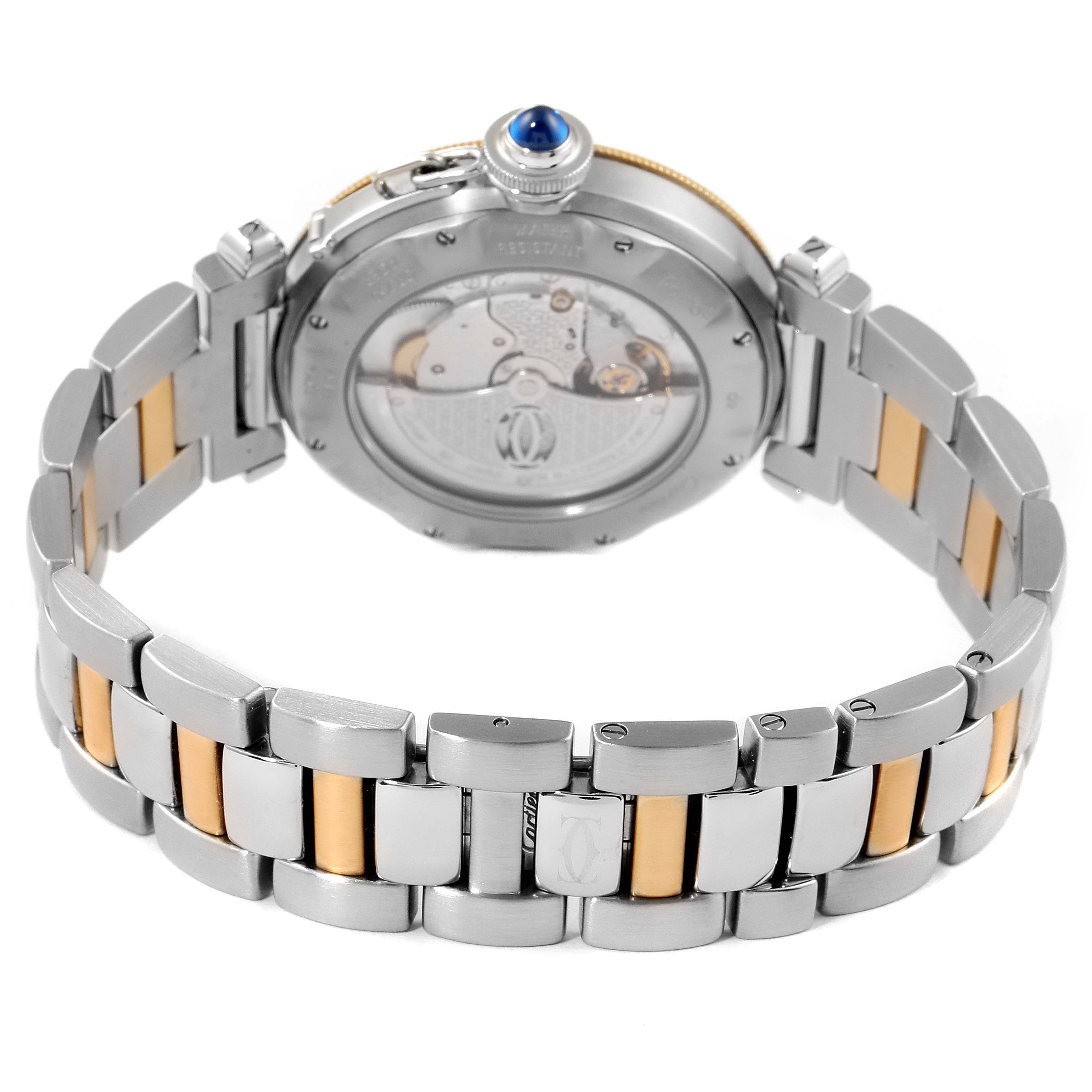The image shows the back view of the Cartier Pasha 2378 Men's Steel and Gold (two tone) Silver Dial 2378 Men's Steel and Gold (two tone) Silver Dial watch, showcasing its stainless steel and gold bracelet along with the movement.