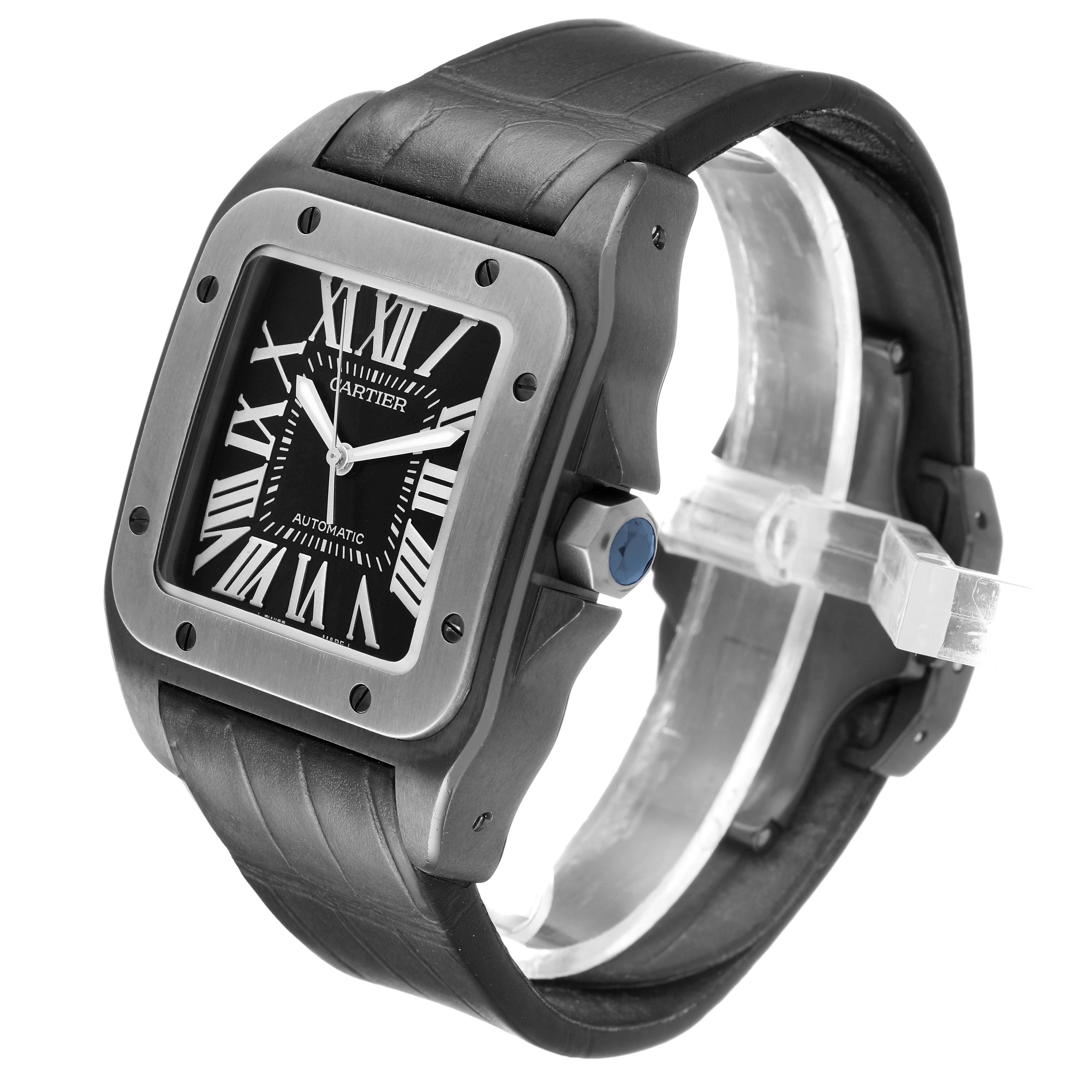 The Cartier Santos W2020010 Men's Stainless Steel Black Dial watch is shown at a three-quarter angle highlighting the case, bezel, strap, and crown.