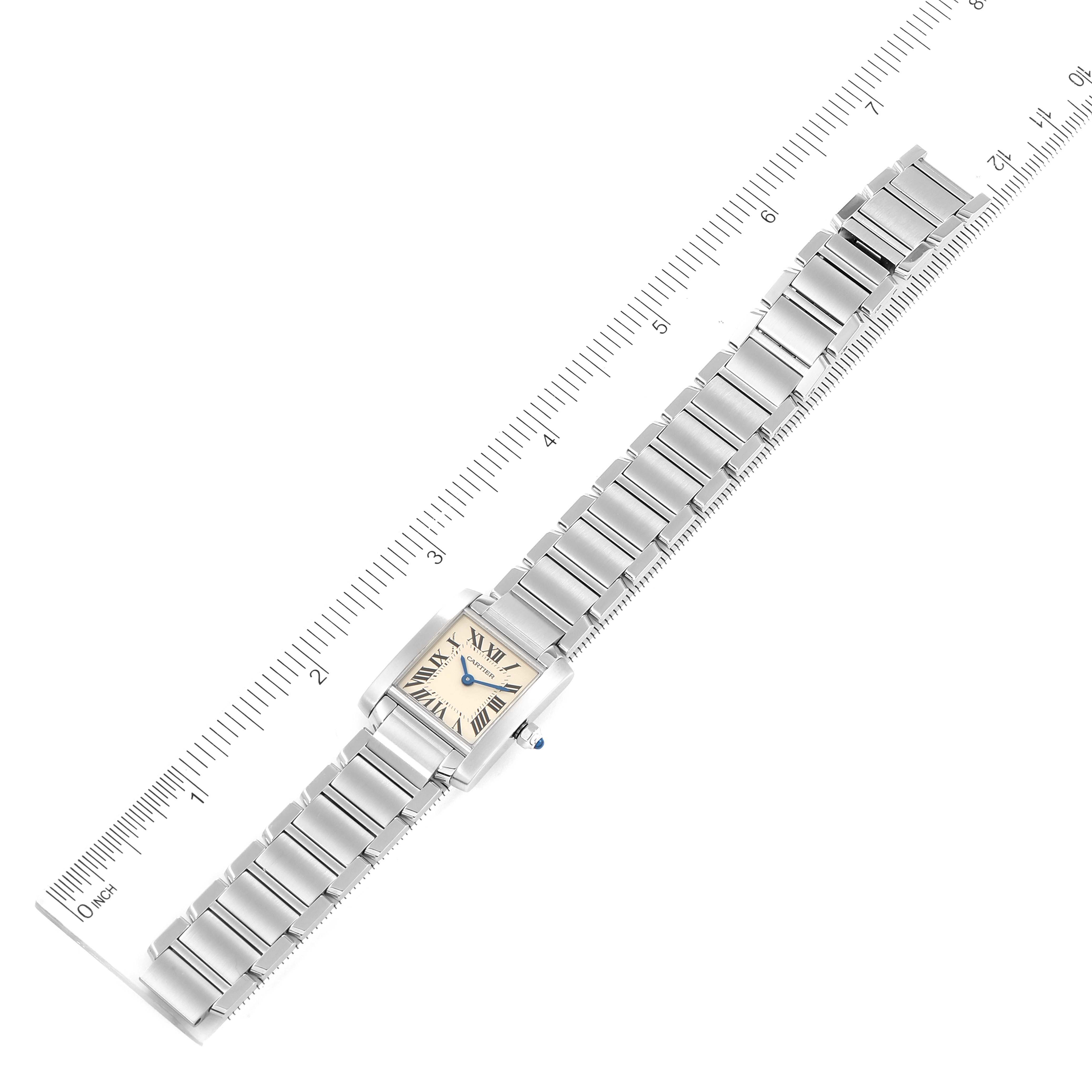 The image shows the full length of a Cartier Tank Francaise W51008Q3 Women's Stainless Steel Silver Dial W51008Q3 Women's Stainless Steel Silver Dial watch laid flat with a ruler beside it for scale.