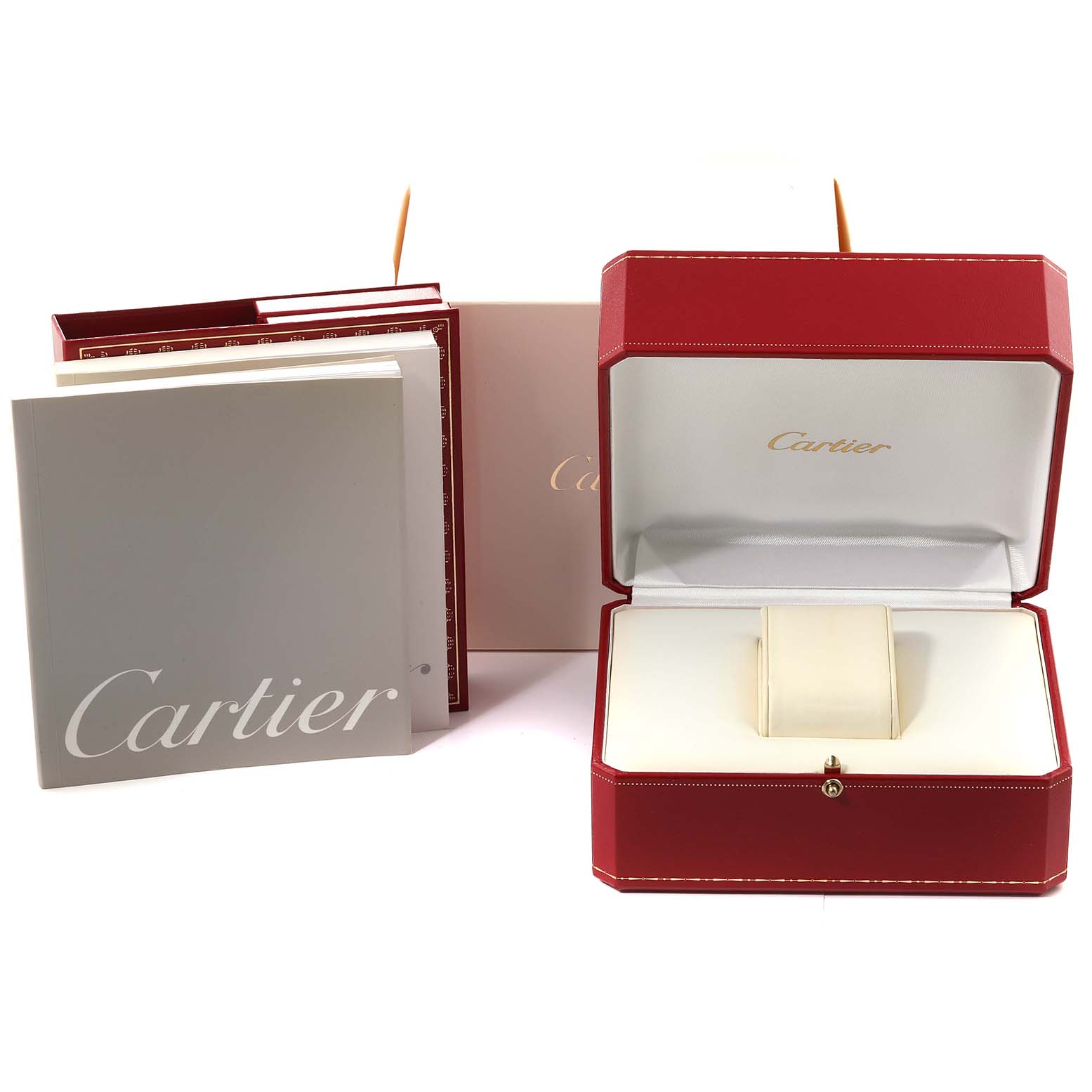 This image shows the packaging and manuals for a Cartier Tank Française watch.