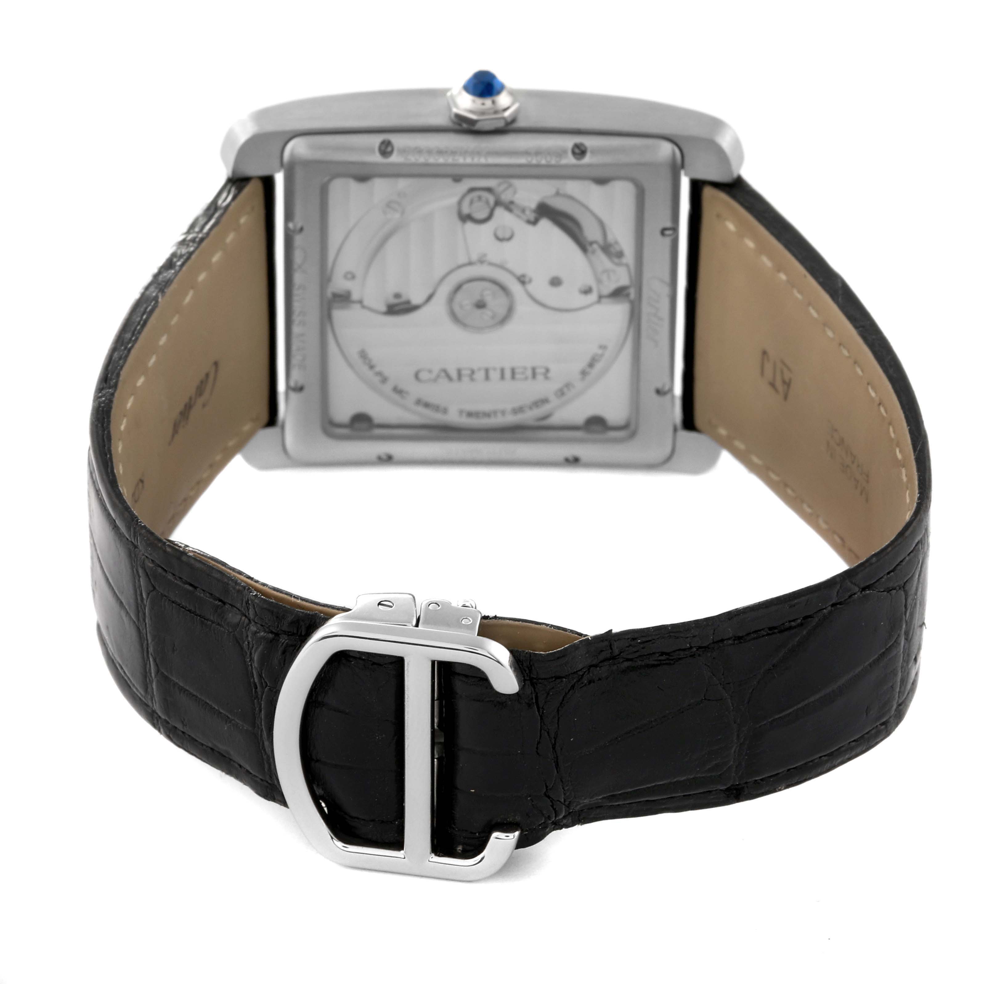 The image shows the back view of a Cartier Tank MC W5330003 Men's Stainless Steel Silver Dial W5330003 Men's Stainless Steel Silver Dial watch, highlighting its leather strap and transparent case back.