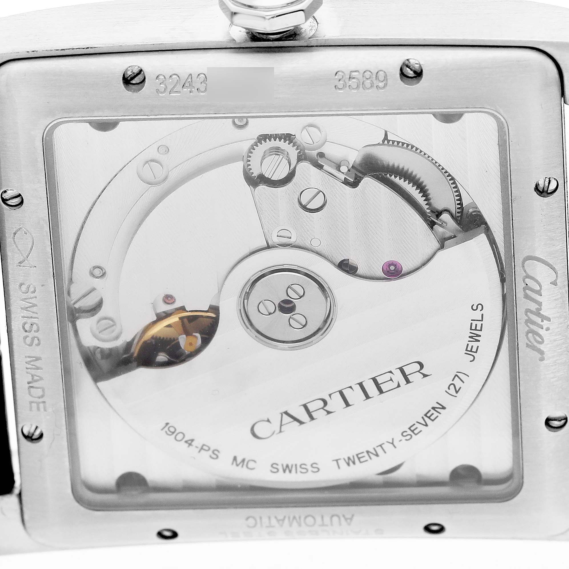 The image shows the back view of a Cartier Tank MC W5330003 Men's Stainless Steel Silver Dial watch, highlighting its movement and internal components.
