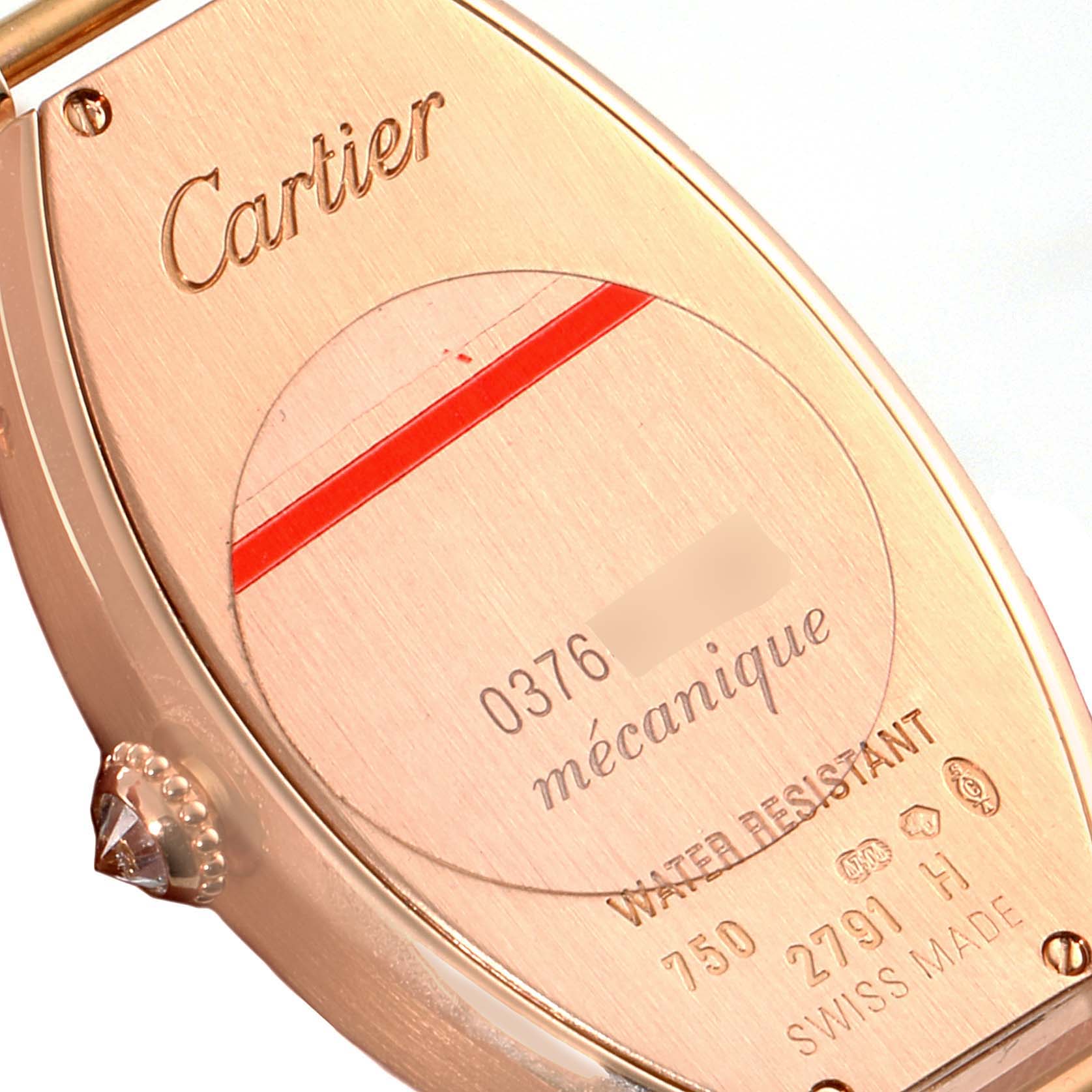 This image shows the back case of a Cartier Tonneau WE400331 Women's Rose Gold Silver Dial WE400331 Women's Rose Gold Silver Dial model watch, highlighting its engravings and markings.