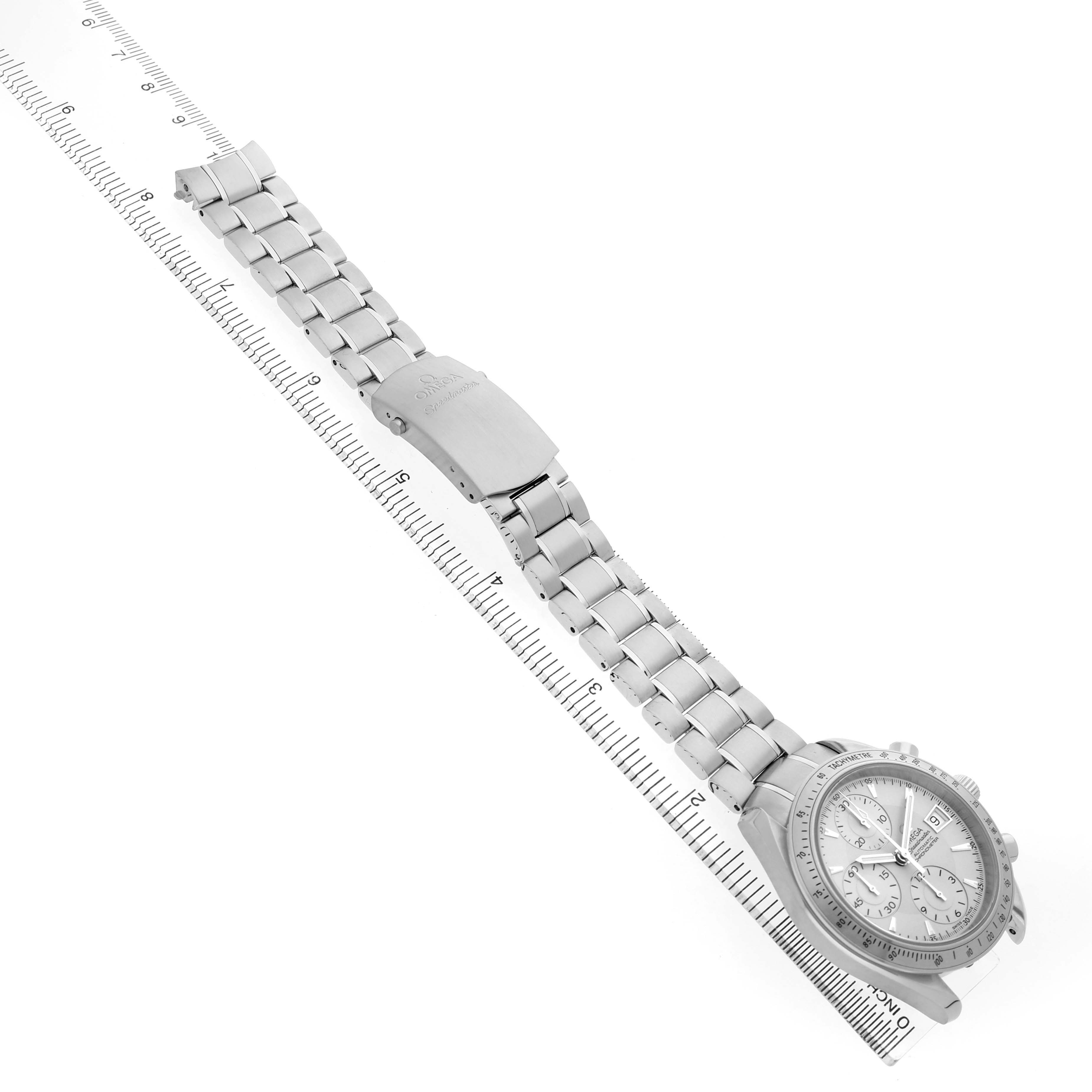 The Omega Speedmaster 3211.30.00 Men's Stainless Steel Silver Dial watch is shown from an angled top-down view, highlighting its bracelet and clasp.