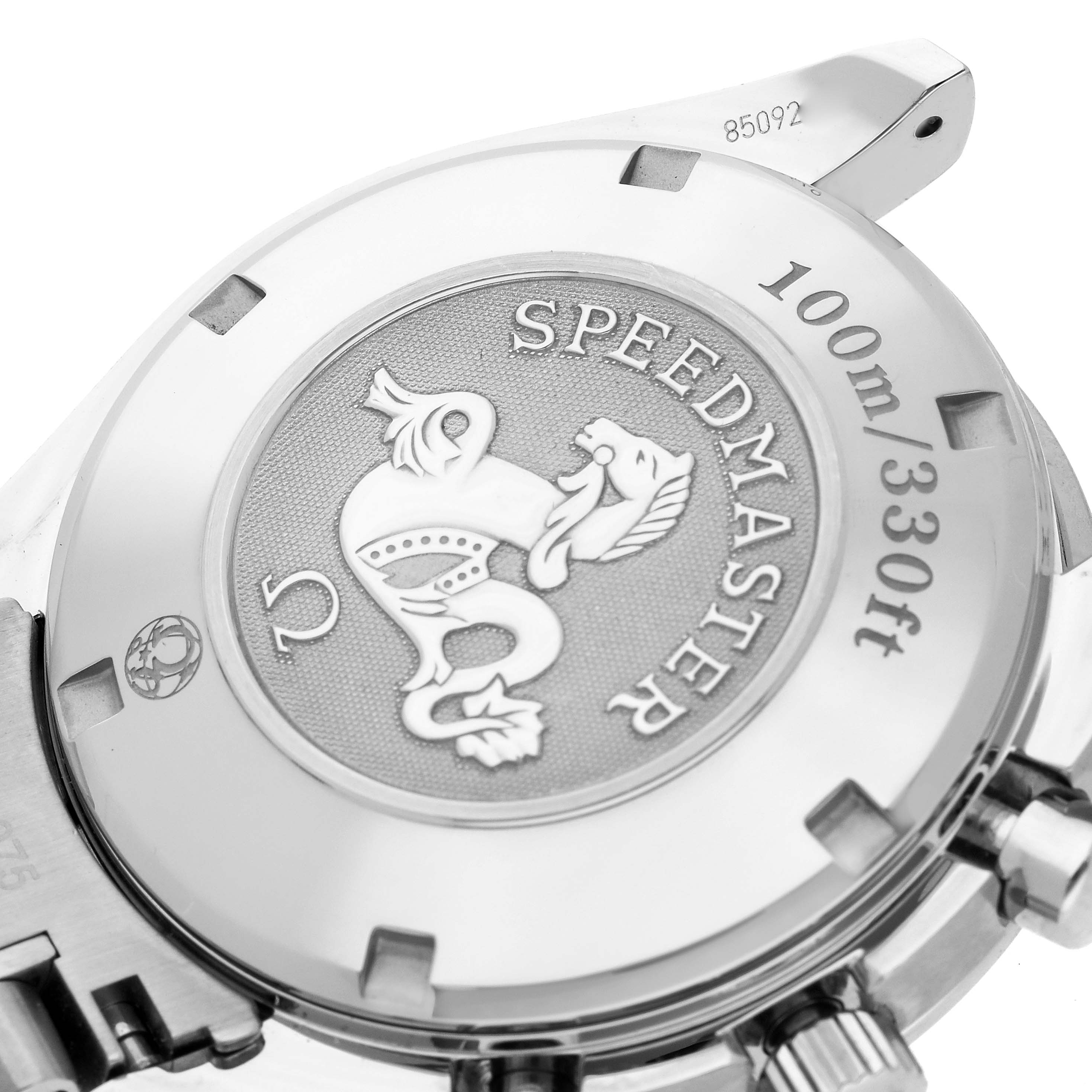 The image shows the engraved case back of an Omega Speedmaster 323.30.40.40.04.001 Men
s Stainless Steel White Dial 323.30.40.40.04.001 Men
s Stainless Steel White Dial, highlighting the logo and water resistance marking.