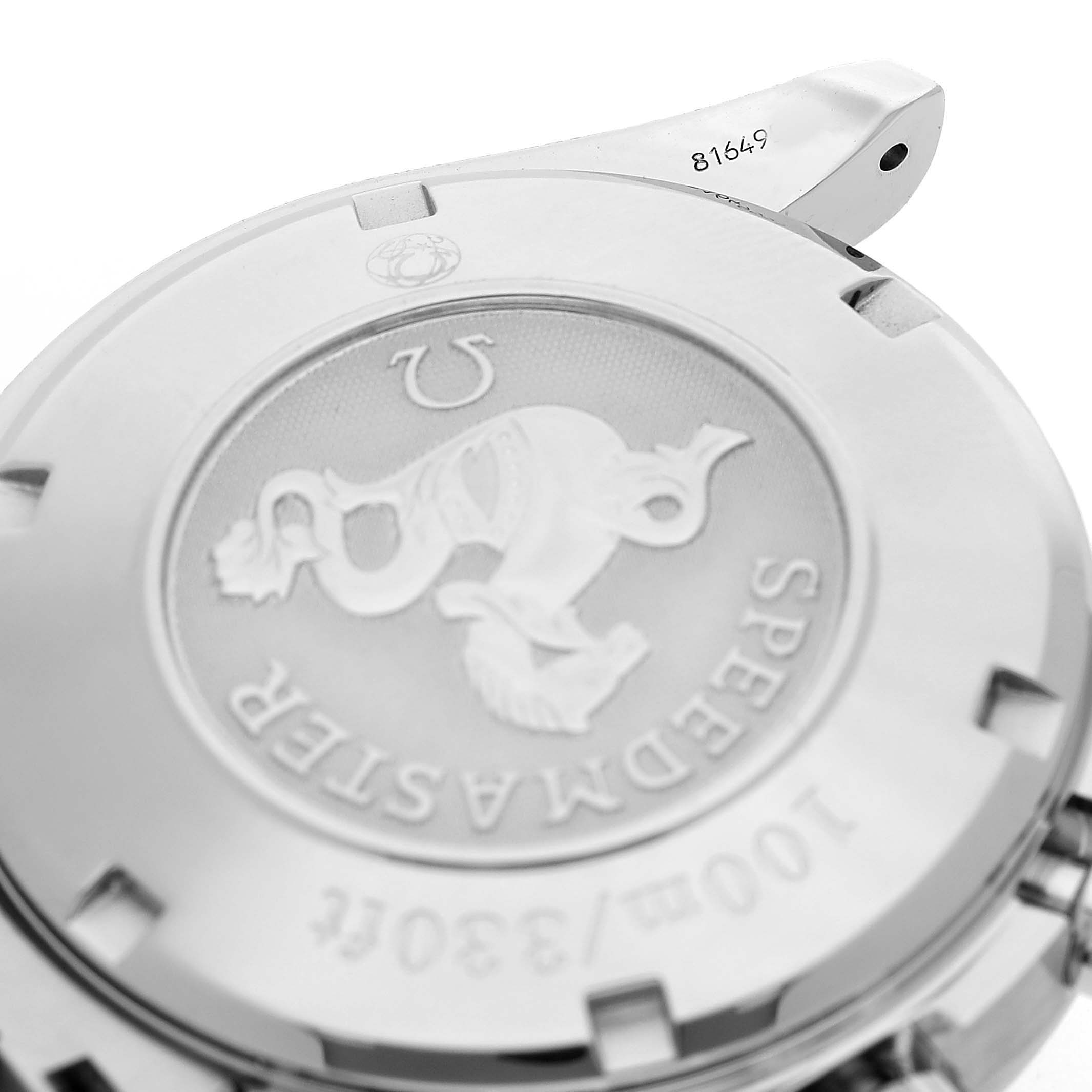 The image shows the case back of an Omega Speedmaster 3220.50.00 Men's Stainless Steel Black Dial, highlighting the engraved logo and model information.