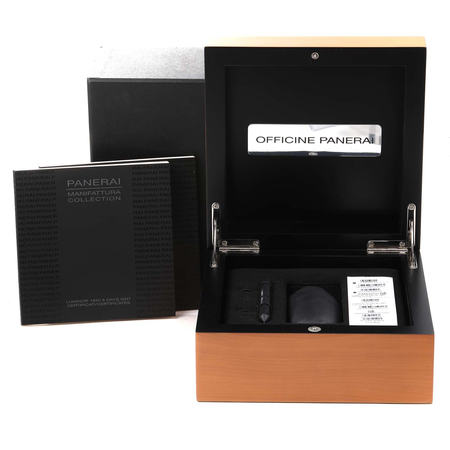The image shows the packaging box and accessories for a Panerai Luminor PAM00233 Men
s Stainless Steel Black Dial PAM00233 Men
s Stainless Steel Black Dial watch, including the booklet and a tool.