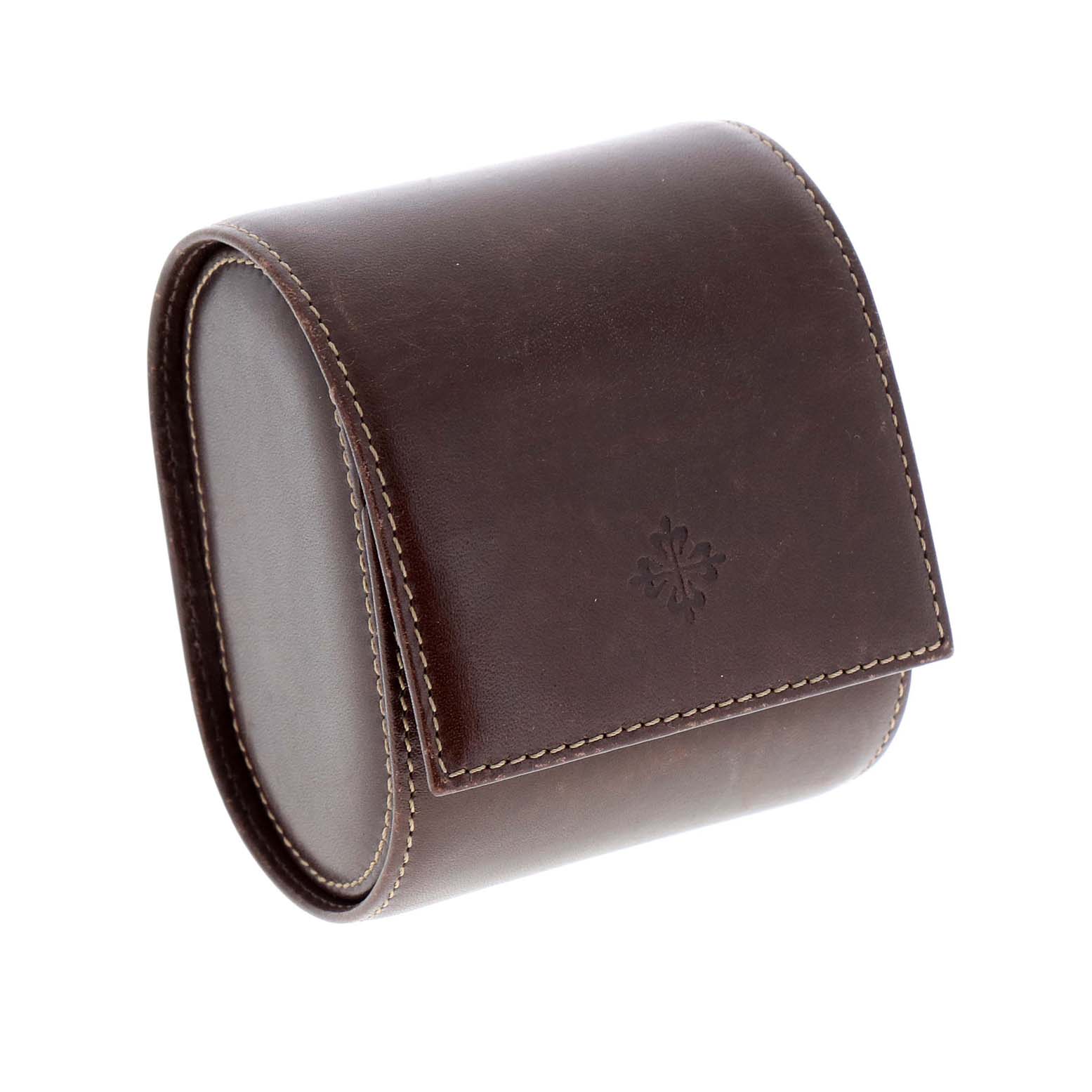 This image shows a brown leather case for the Aquanaut model by Patek Philippe.