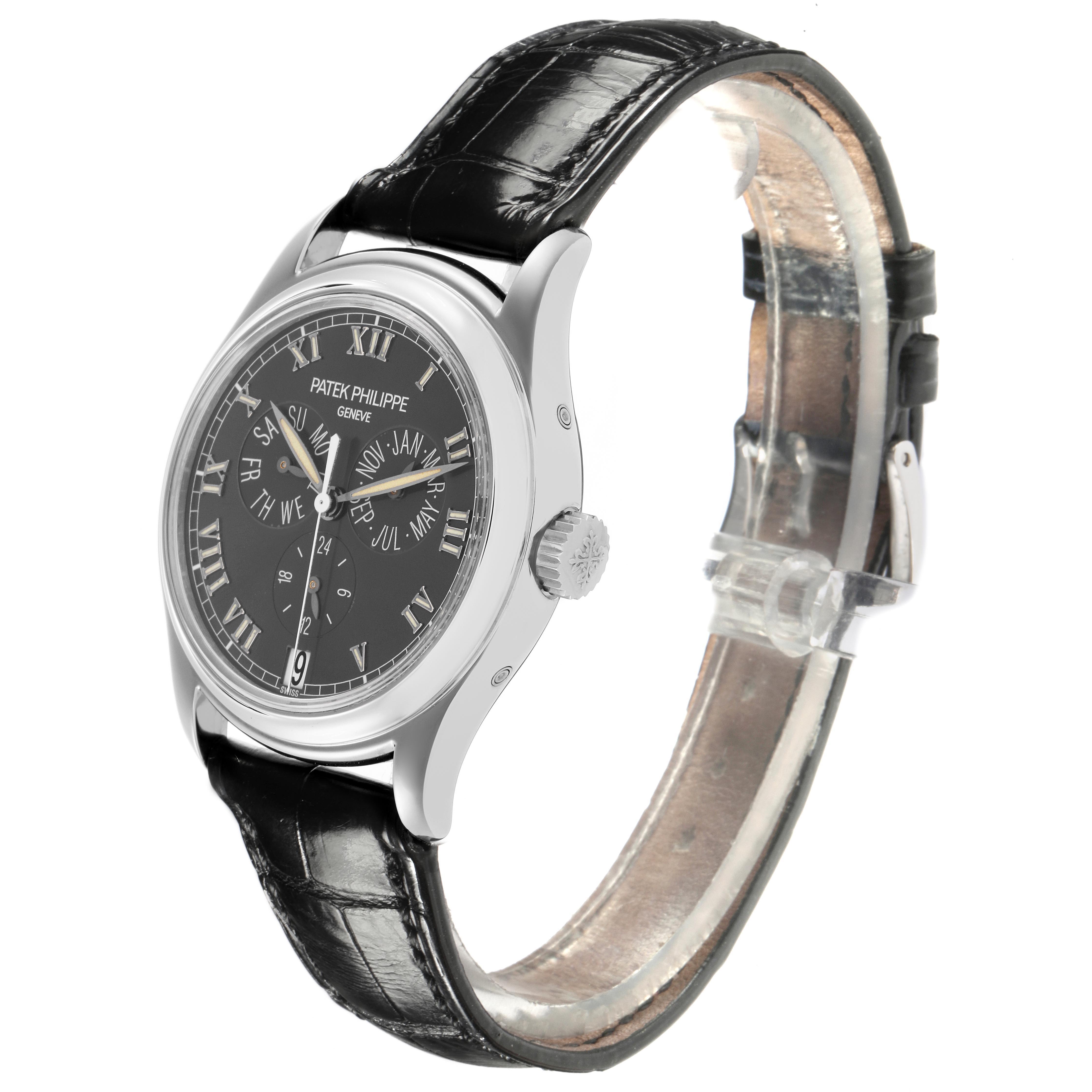 The Patek Philippe Complications 5035P-024 Men's Platinum Grey Dial 5035P-024 Men's Platinum Grey Dial model is shown at a three-quarter angle, displaying the face, crown, and leather strap.