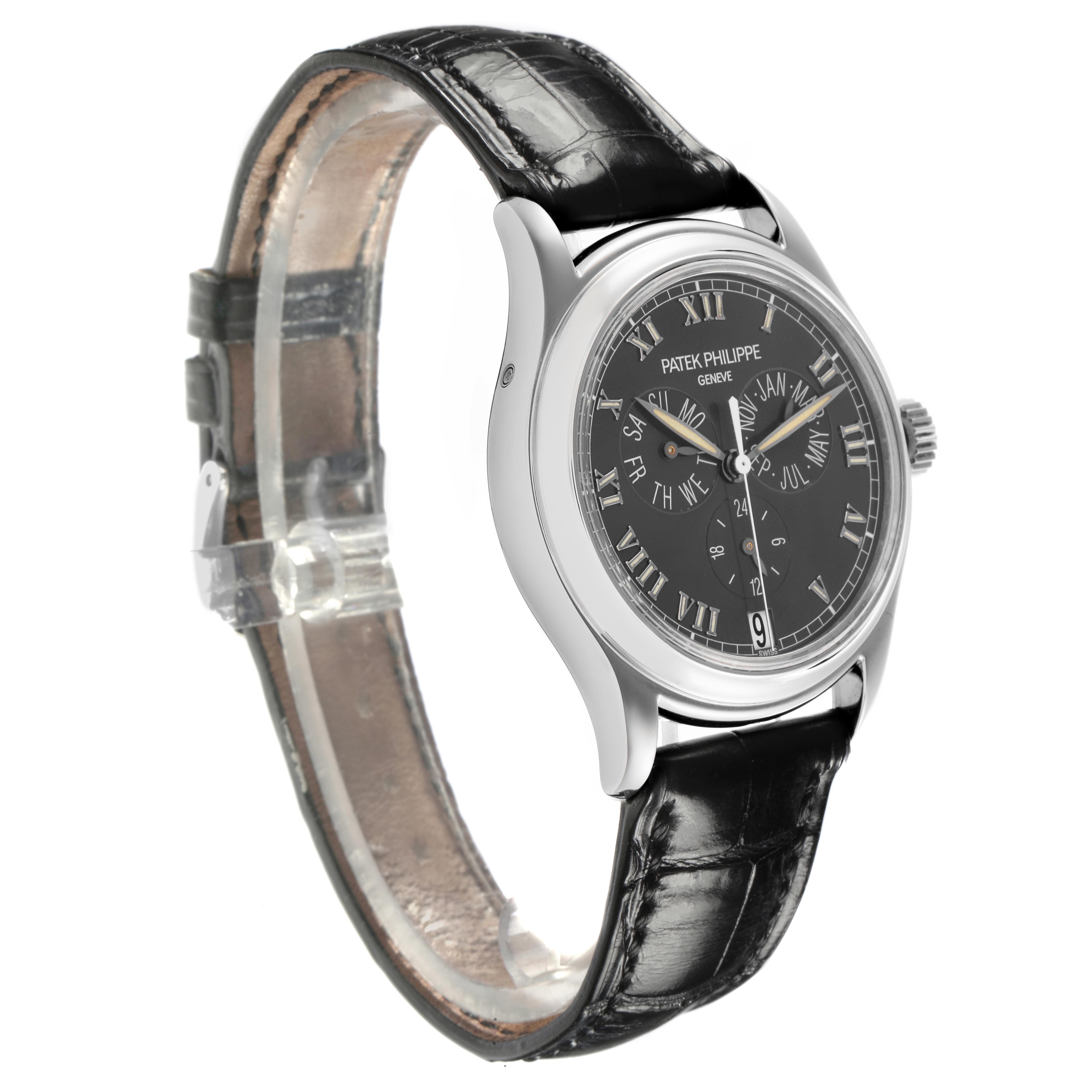 The Patek Philippe Complications 5035P-024 Men's Platinum Grey Dial 5035P-024 Men's Platinum Grey Dial watch is shown at a three-quarter angle, displaying the dial, case, and part of the leather strap.