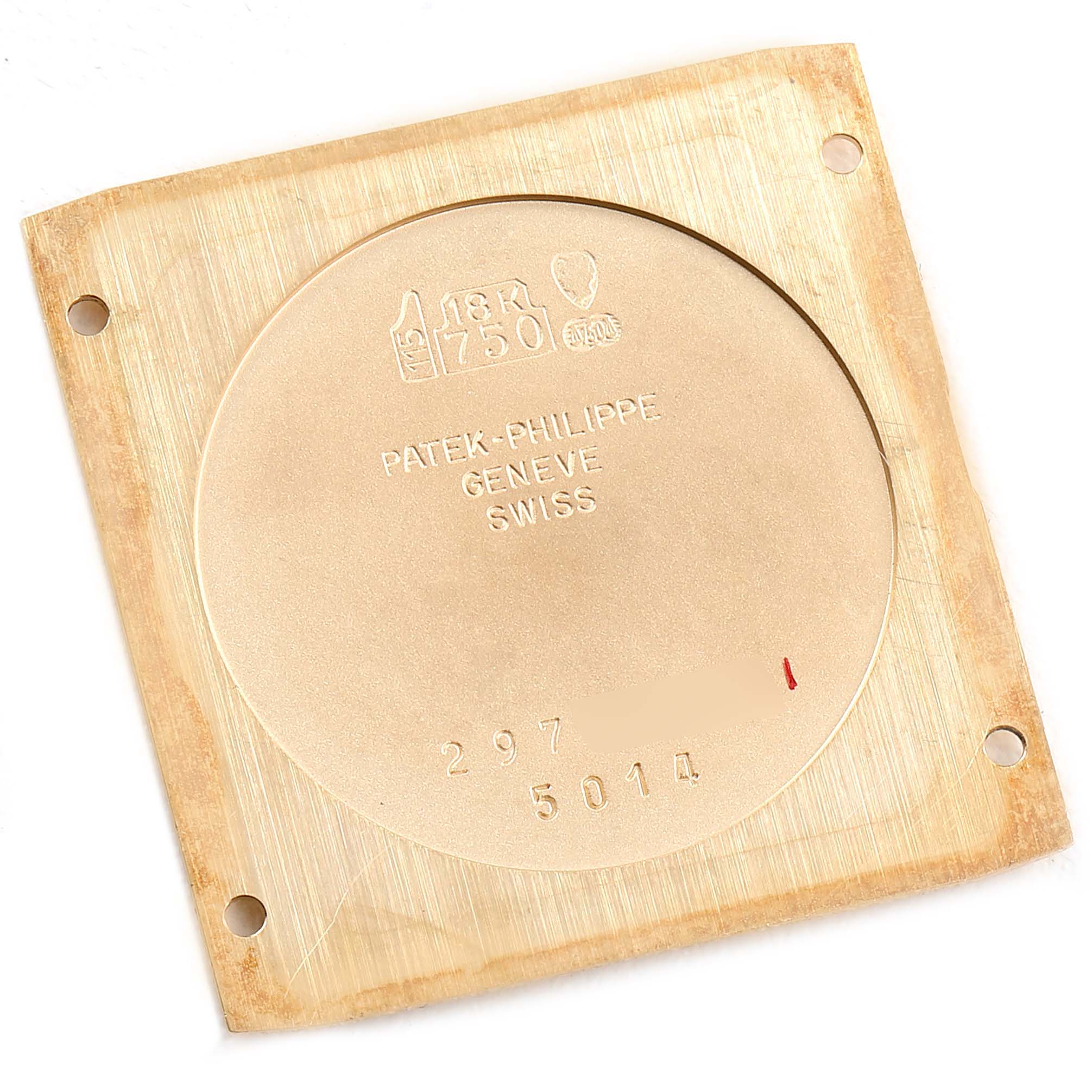 This image shows the inside of the case back of a Patek Philippe Gondolo 5014J Men's Yellow Gold White Dial 5014J Men's Yellow Gold White Dial watch, featuring the brand's engraving and gold markings.