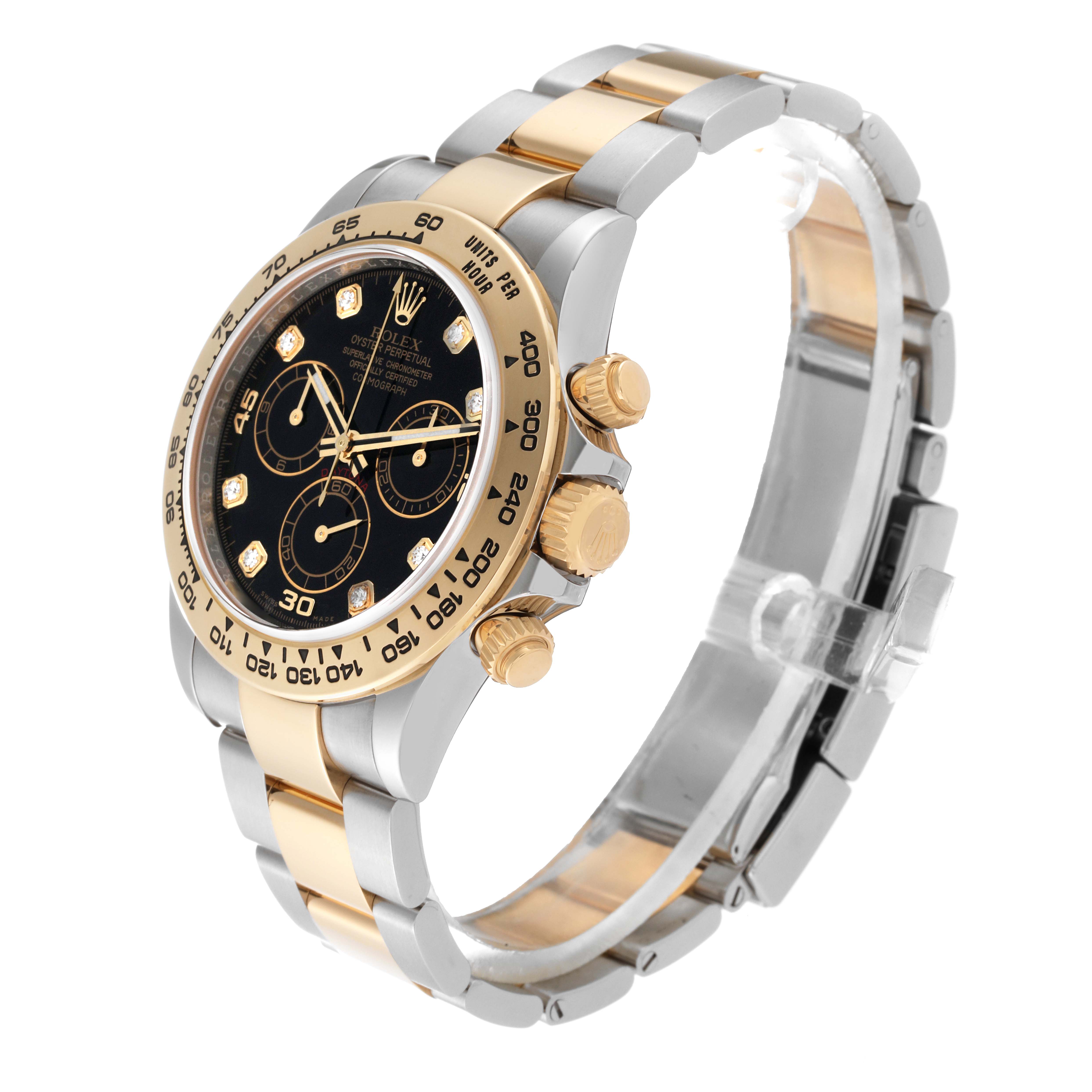 The image shows a side and front angle of a Rolex Daytona 116503 Men
s Steel and Gold (two tone) Black Dial 116503 Men
s Steel and Gold (two tone) Black Dial watch, highlighting its dial, bezel, pushers, and bracelet.