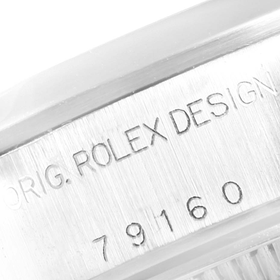 This image shows a close-up of the engraving on the side of the Rolex Datejust 79160 Women's Stainless Steel Blue Dial 79160 Women's Stainless Steel Blue Dial watch case.