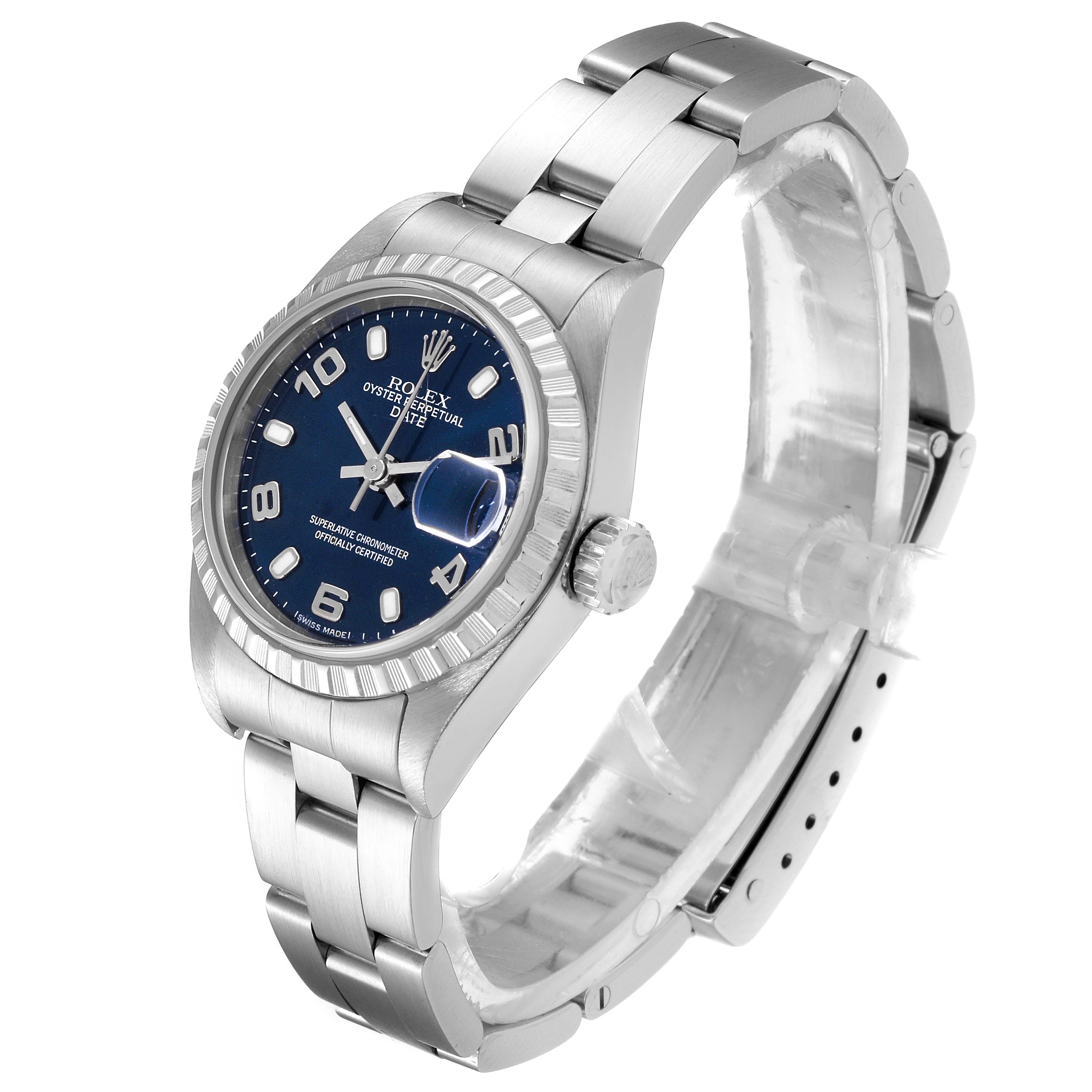 The image shows a Rolex Date 79240 Women
s Stainless Steel Blue Dial 79240 Women
s Stainless Steel Blue Dial model watch at a three-quarter angle, highlighting its blue dial, oyster case, fluted bezel, and bracelet.