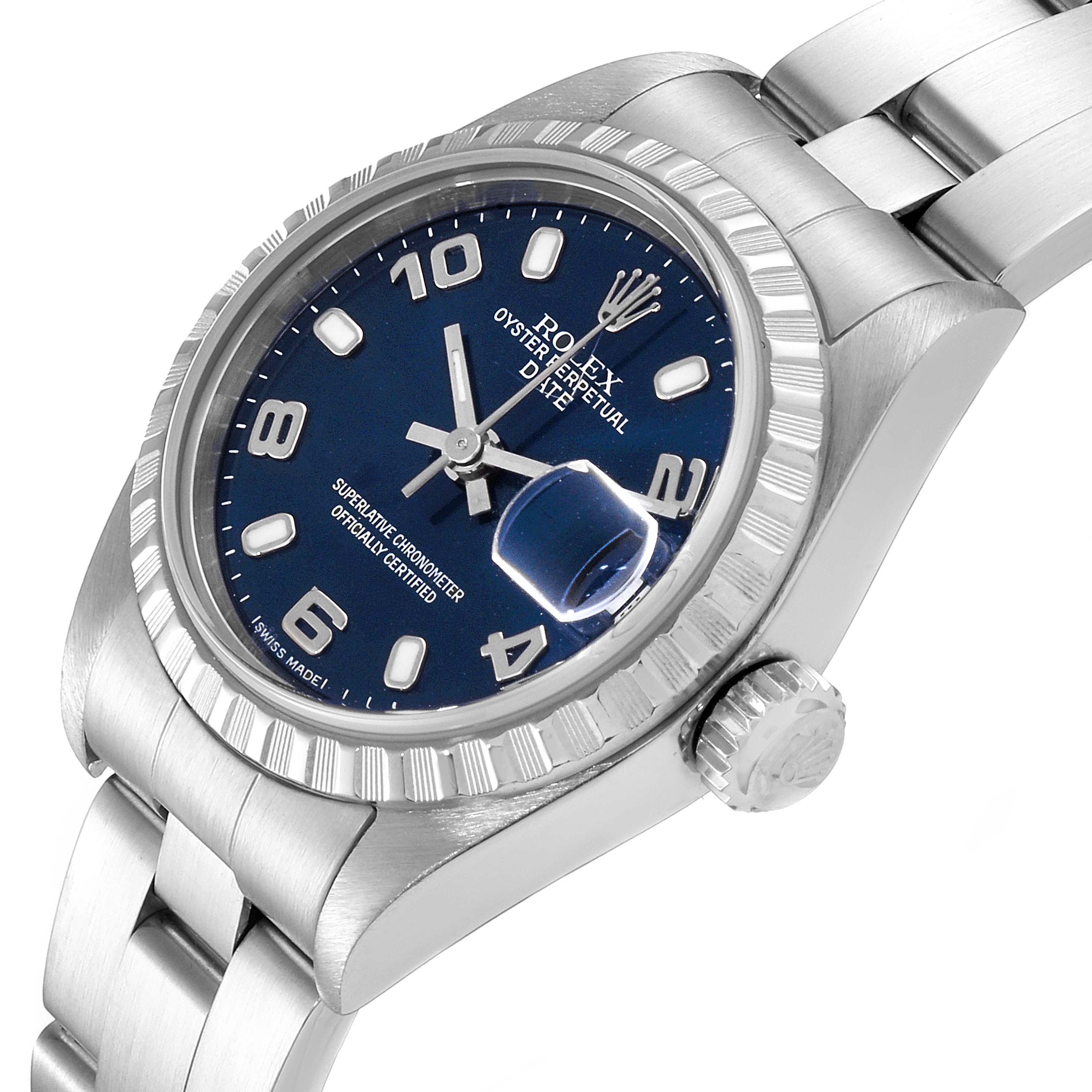 The Rolex Date 79240 Women
s Stainless Steel Blue Dial 79240 Women
s Stainless Steel Blue Dial watch is shown at an oblique angle, highlighting the case, crown, bezel, bracelet, and blue dial.