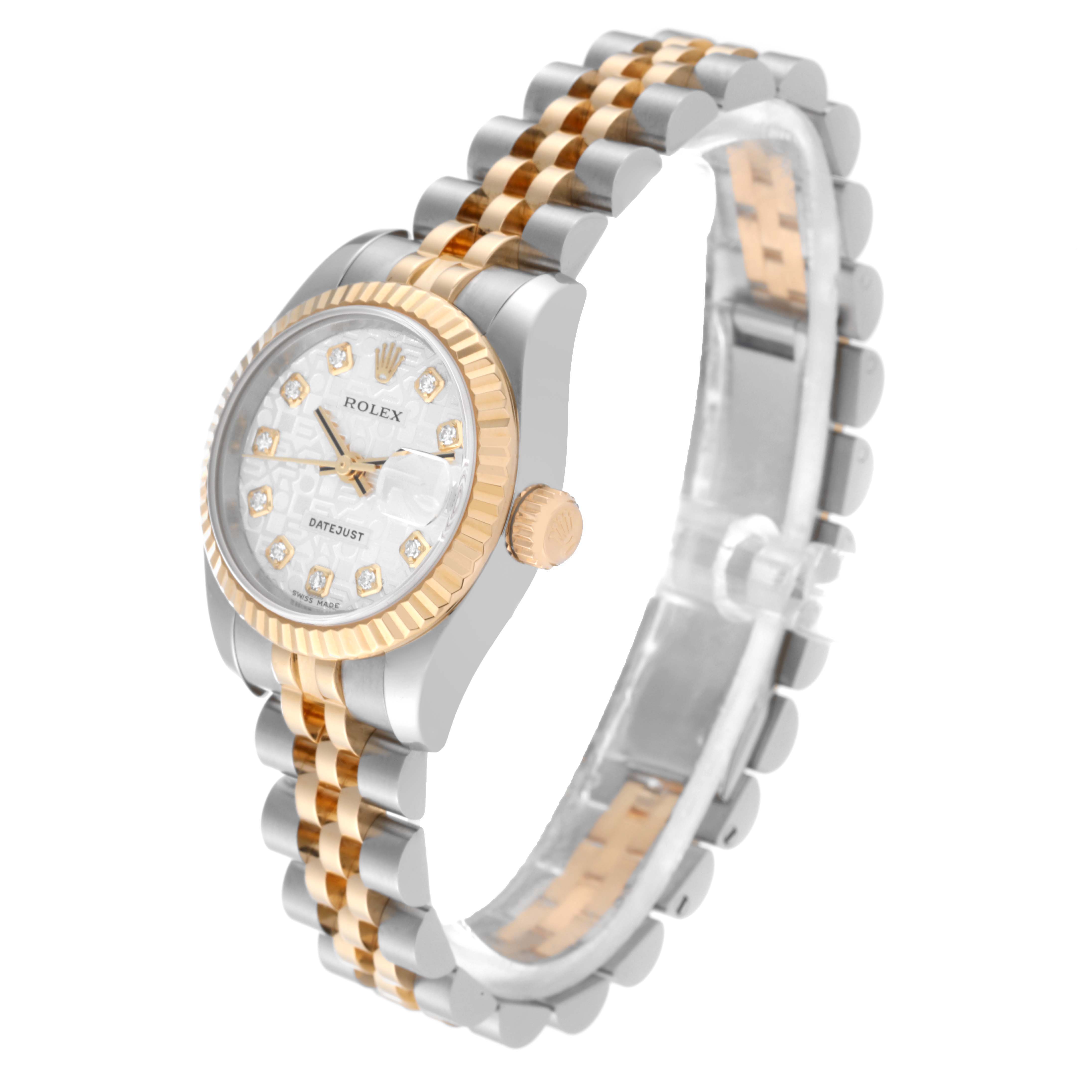 The image shows a side angle of a Rolex Datejust 179173 Women's Steel and Gold (two tone) Silver Dial 179173 Women's Steel and Gold (two tone) Silver Dial, highlighting its two-tone bracelet, case, crown, bezel, and diamond hour markers.