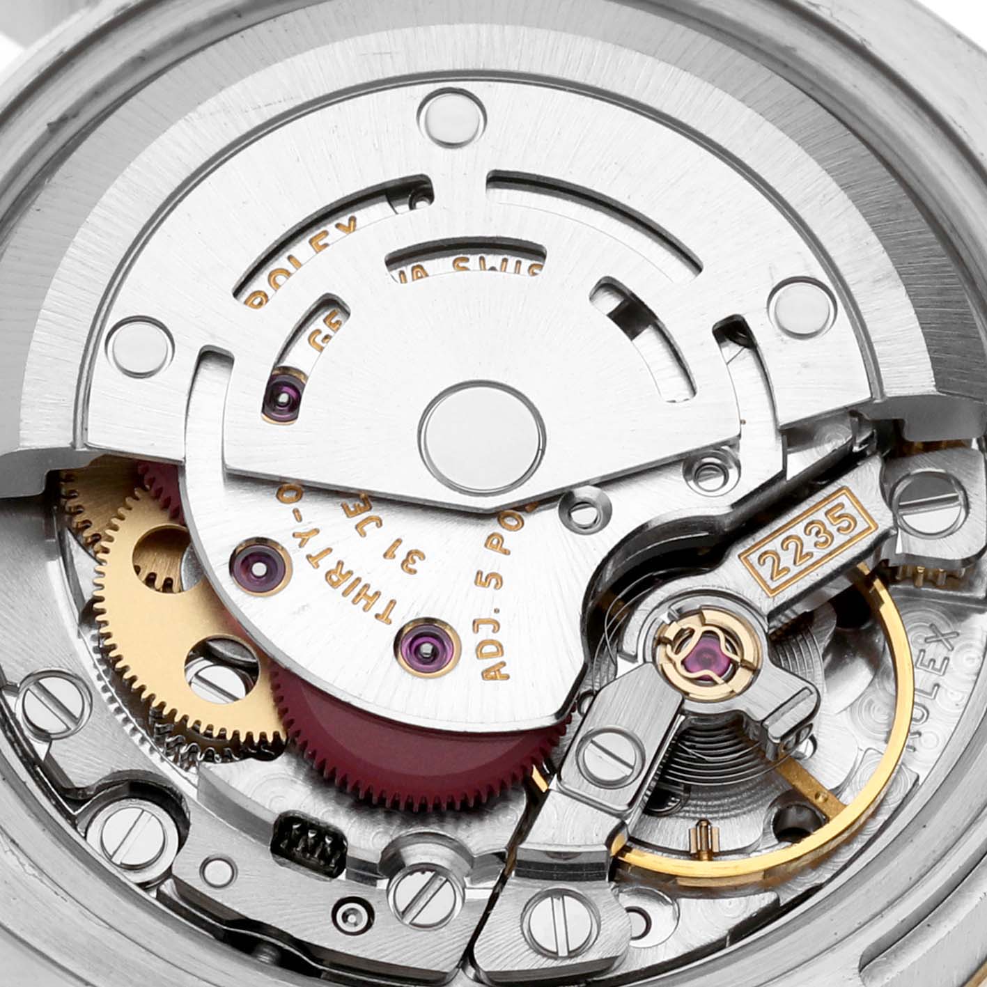 This image shows a close-up of the internal movement mechanism of a Rolex Datejust 179173 Women's Steel and Gold (two tone) Silver Dial 179173 Women's Steel and Gold (two tone) Silver Dial watch from an aerial angle.