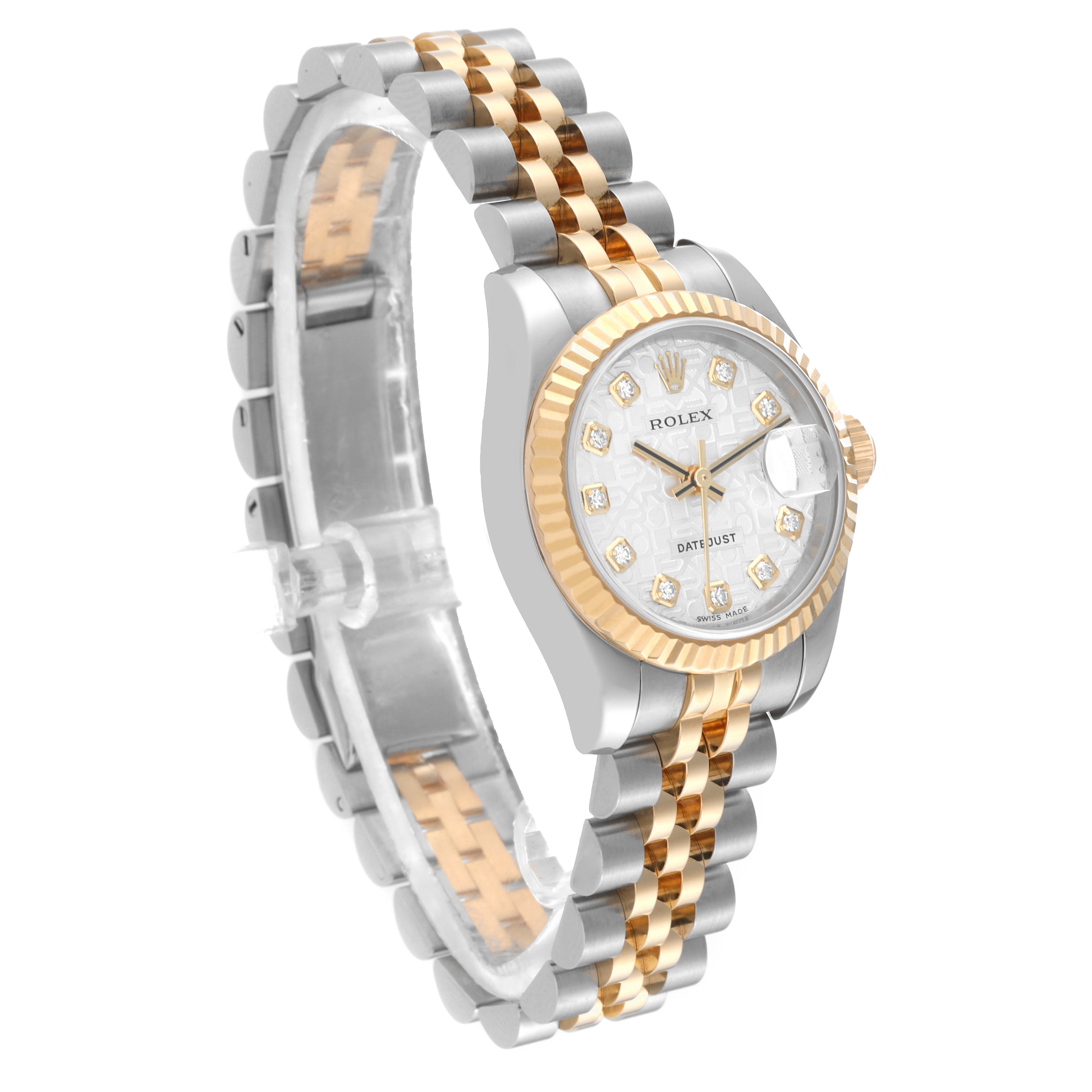 The Rolex Datejust 179173 Women's Steel and Gold (two tone) Silver Dial 179173 Women's Steel and Gold (two tone) Silver Dial watch is shown from a front-right angle, highlighting its two-tone bracelet, dial, and fluted bezel.
