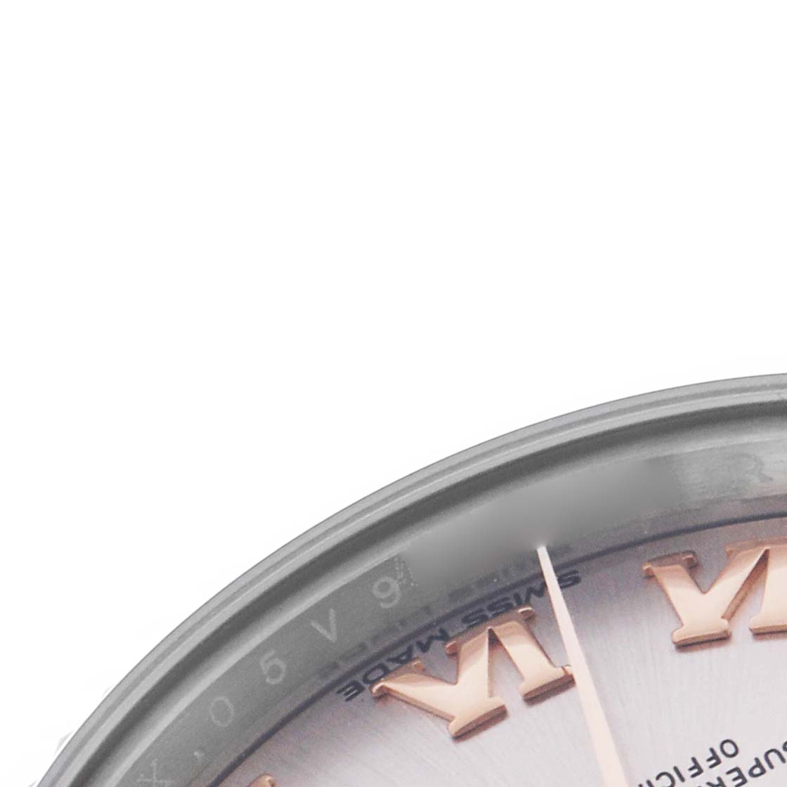 The image shows a close-up of the Rolex Datejust 279171 Women's Steel and Gold (two tone) Pink Dial 279171 Women's Steel and Gold (two tone) Pink Dial, highlighting its dial and partial Roman numerals from an angled top view.
